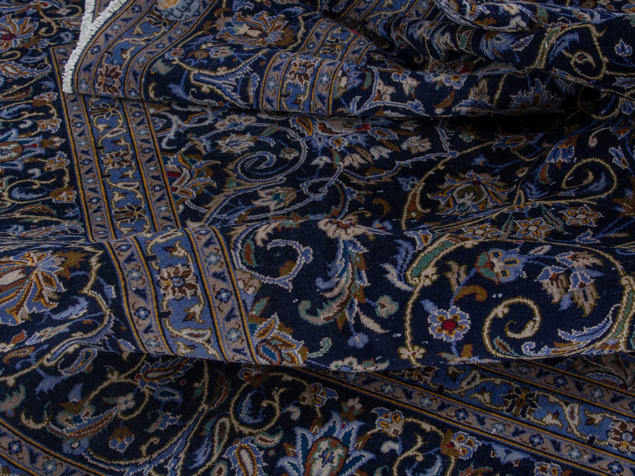 Persian Kashan oversized rug in navy and cream, view 17 of 21