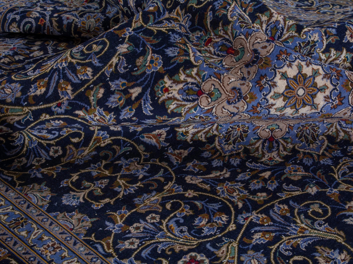 Persian Kashan oversized rug in navy and cream, view 21 of 22