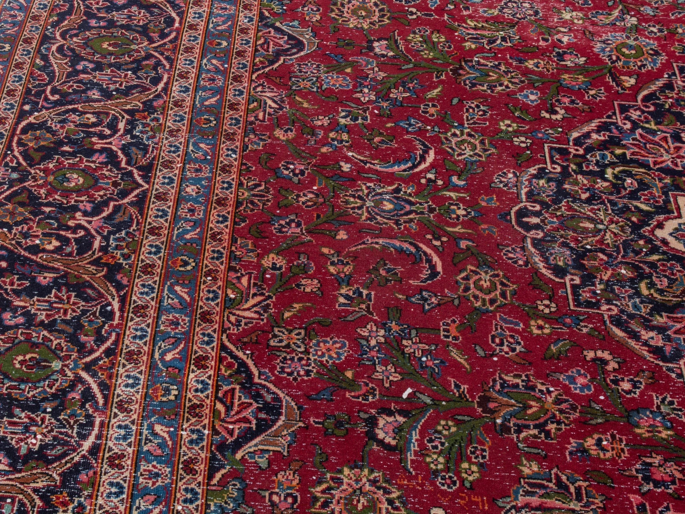 Persian Kashan oversized rug in deep red and burgundy, view 9 of 26