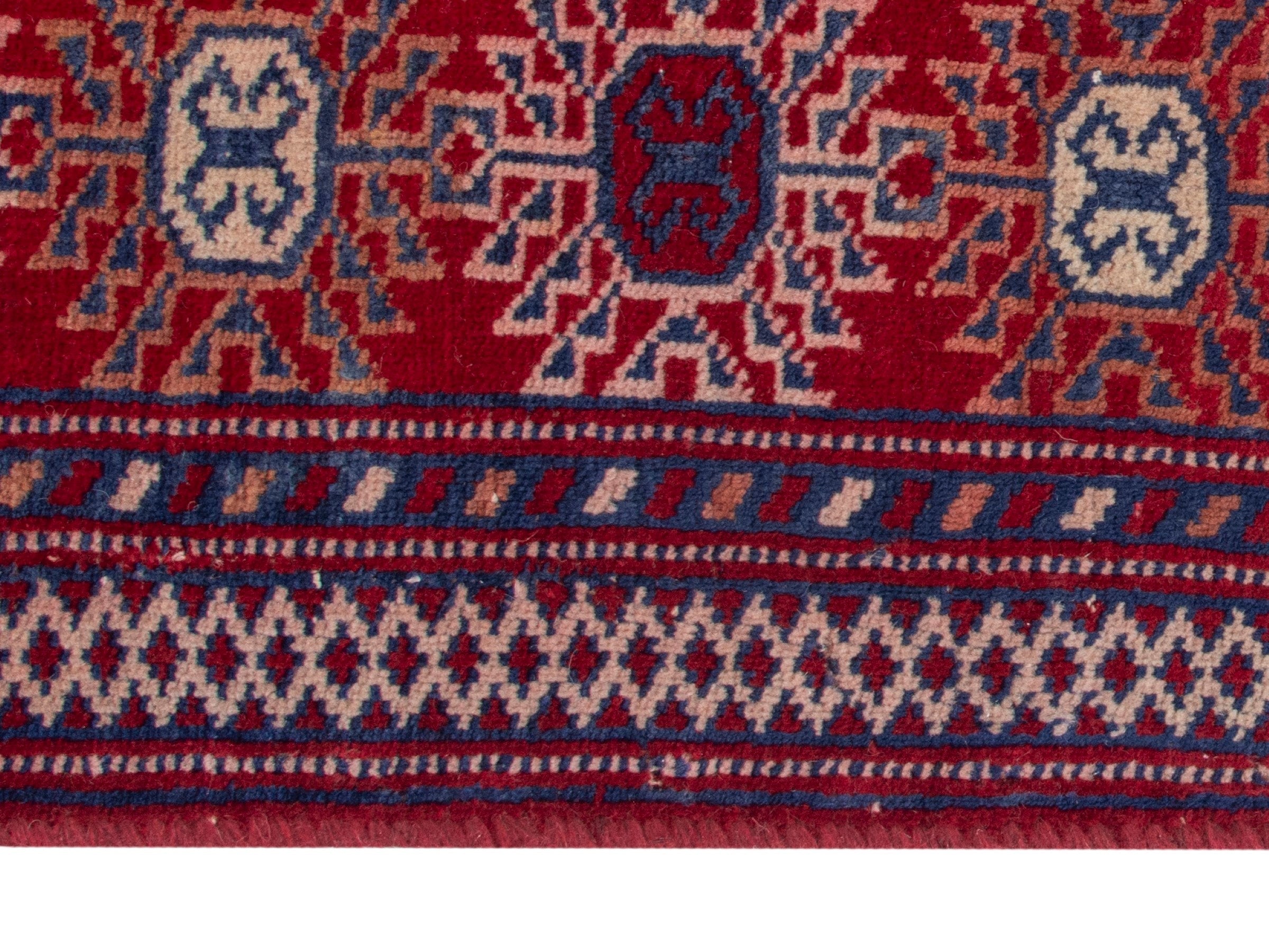 Persian Torkaman area rug in burgundy and deep red, view 10 of 19