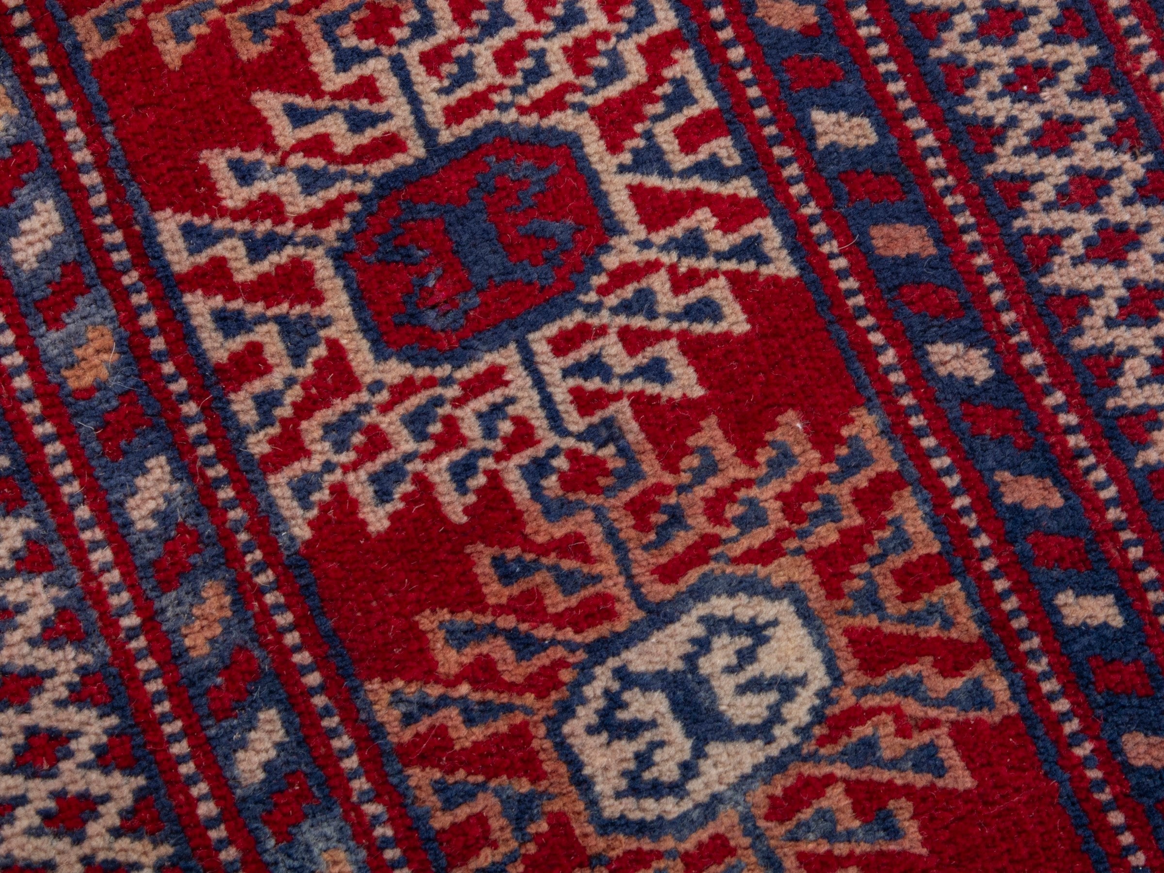 Persian Torkaman area rug in burgundy and deep red, view 9 of 19