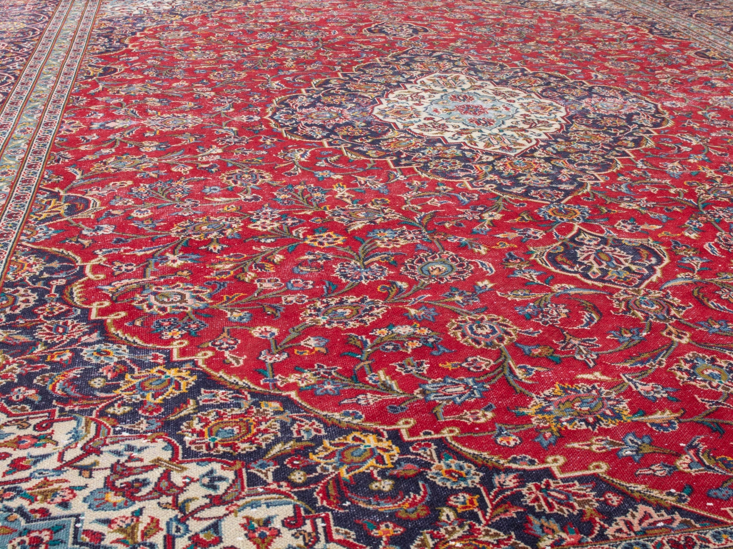 Persian Kashan oversized rug in deep red and aubergine, view 8 of 21