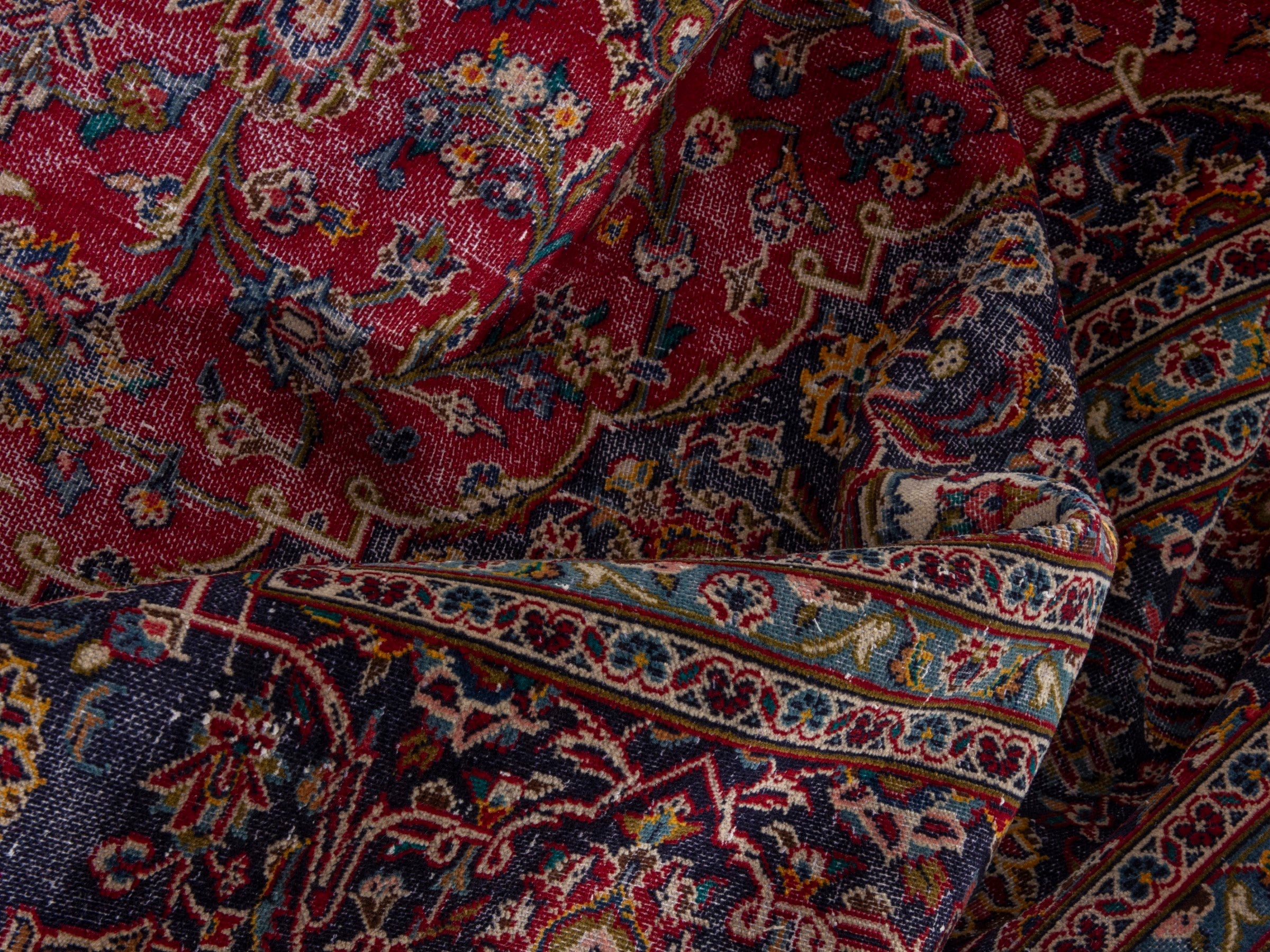 Persian Kashan oversized rug in deep red and aubergine, view 18 of 21