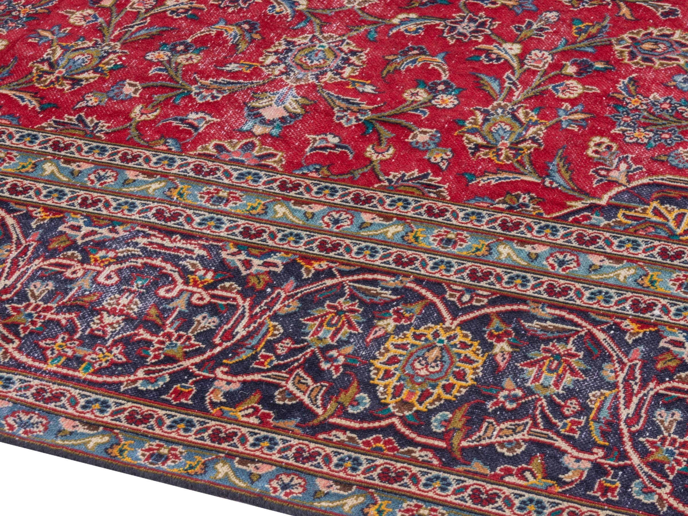 Persian Kashan oversized rug in deep red and aubergine, view 6 of 21