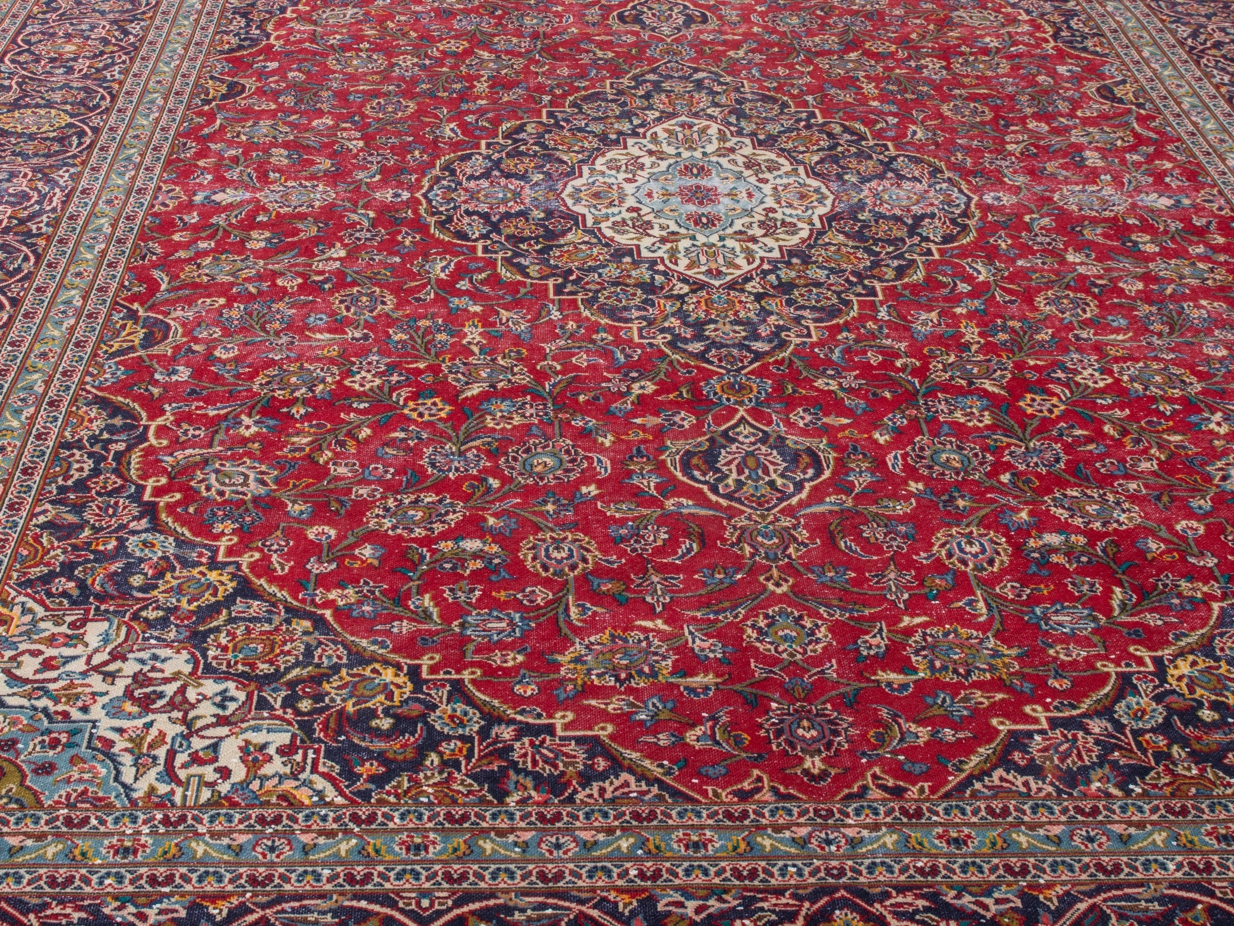 Persian Kashan oversized rug in deep red and aubergine, view 7 of 21