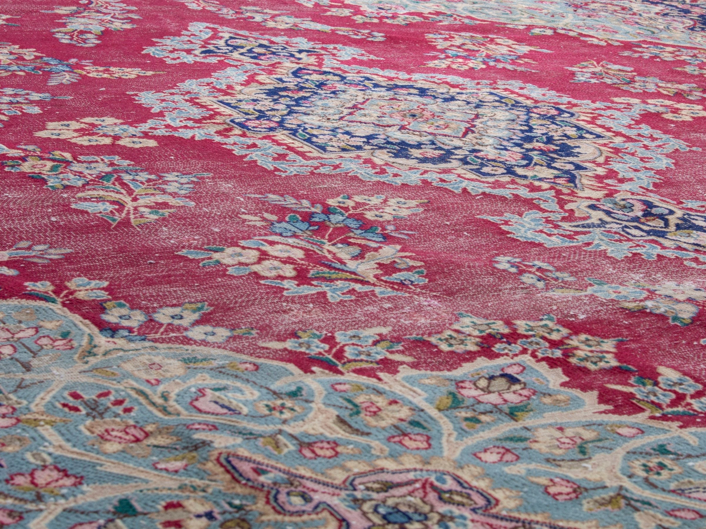 Persian Kerman oversized rug in rose and navy, view 8 of 19