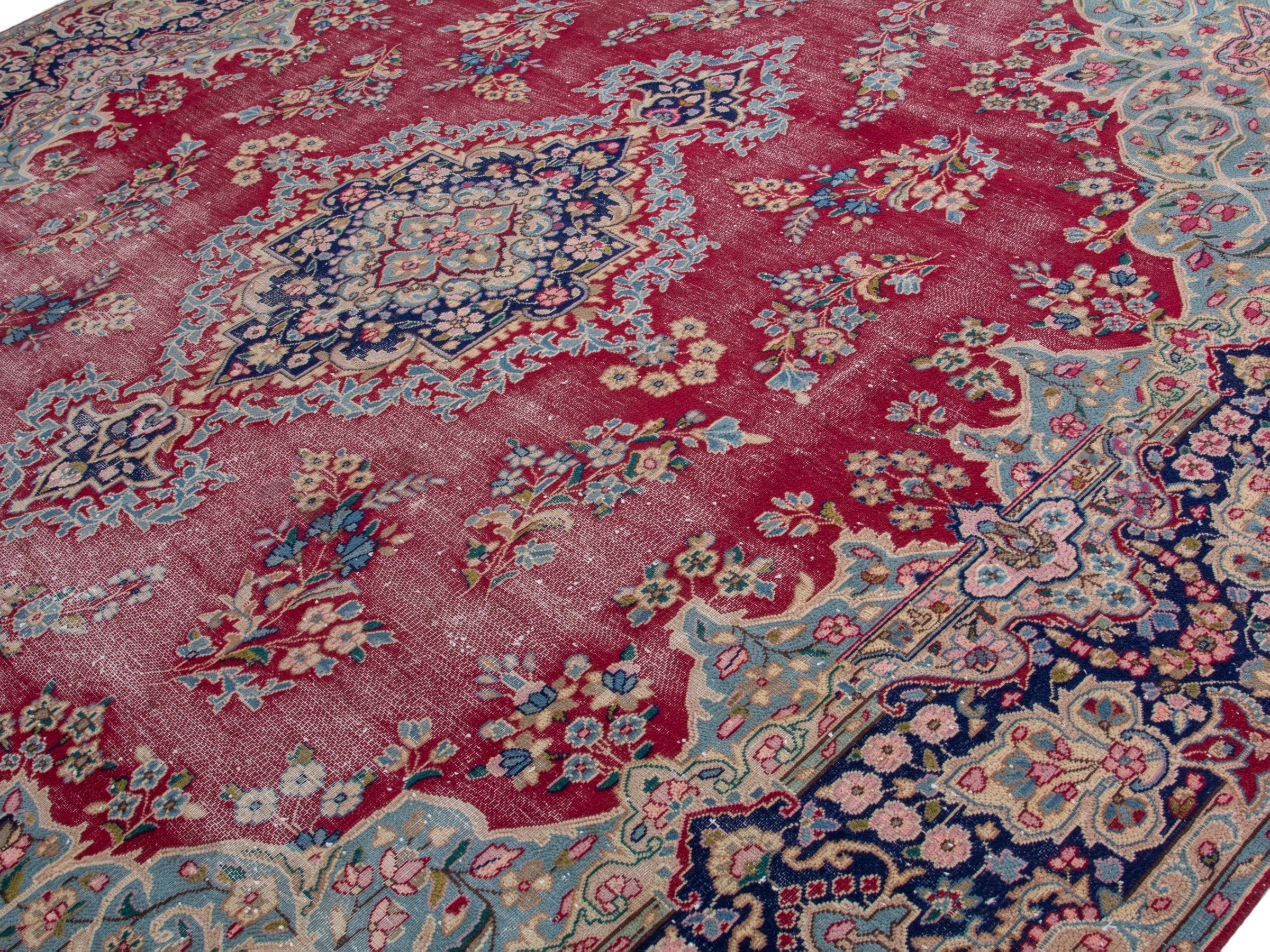 Persian Kerman oversized rug in rose and navy, view 4 of 19