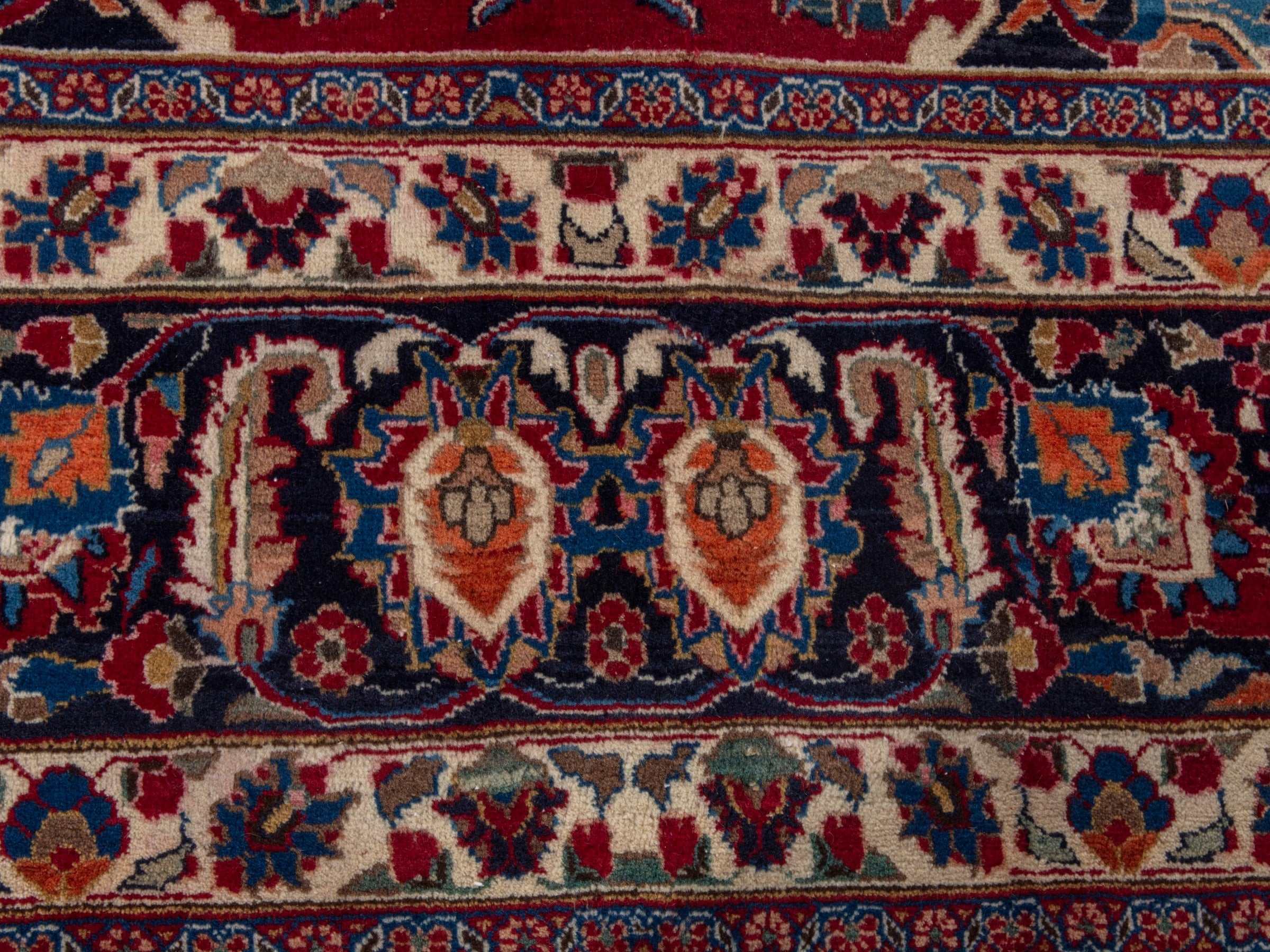 Persian Mashhad oversized rug in deep red and navy, view 11 of 22