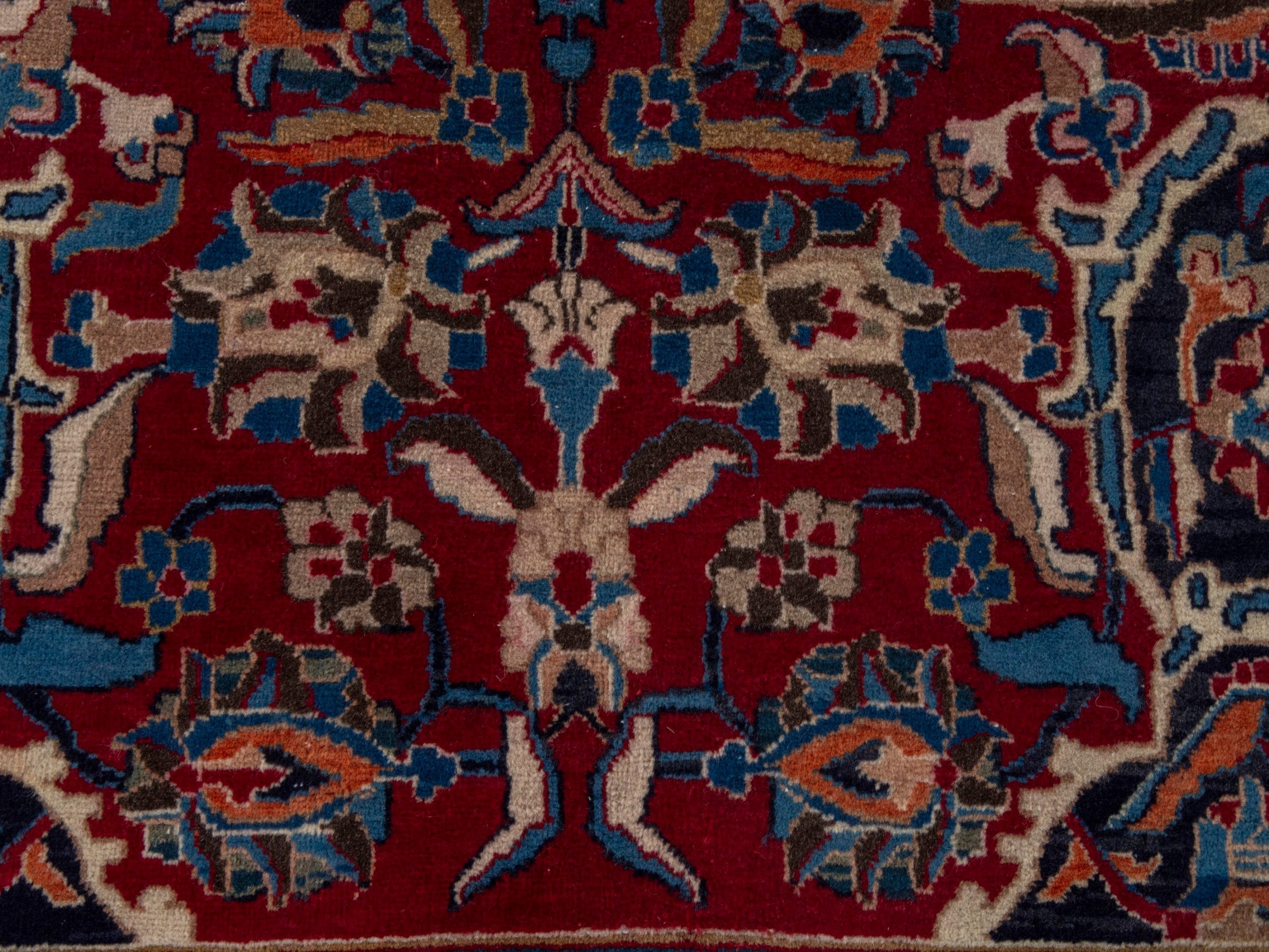 Persian Mashhad oversized rug in deep red and navy, view 12 of 22