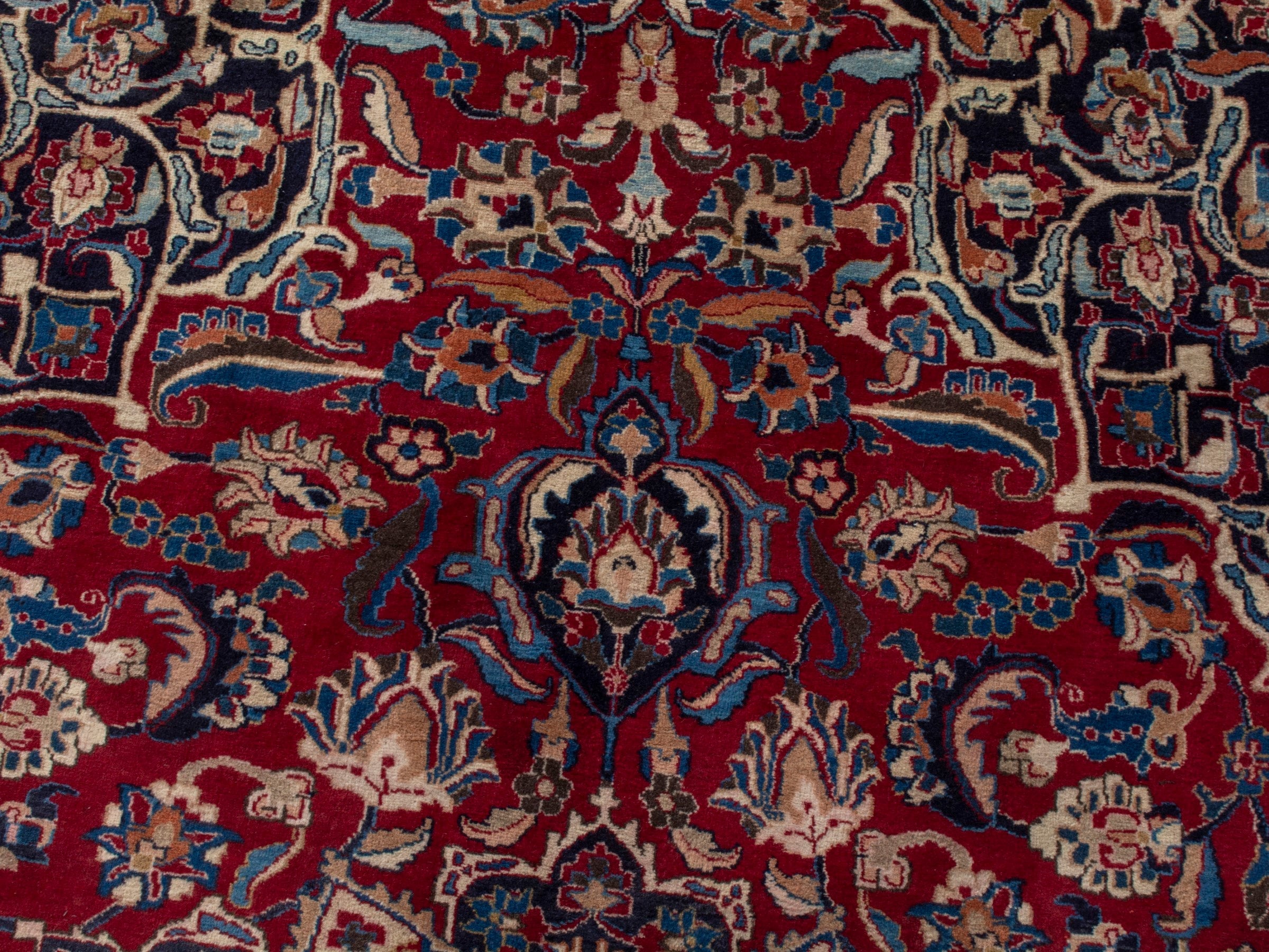 Persian Mashhad oversized rug in deep red and navy, view 15 of 22