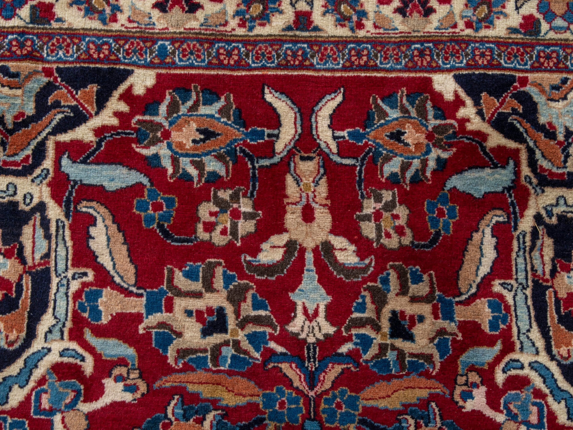 Persian Mashhad oversized rug in deep red and navy, view 17 of 22