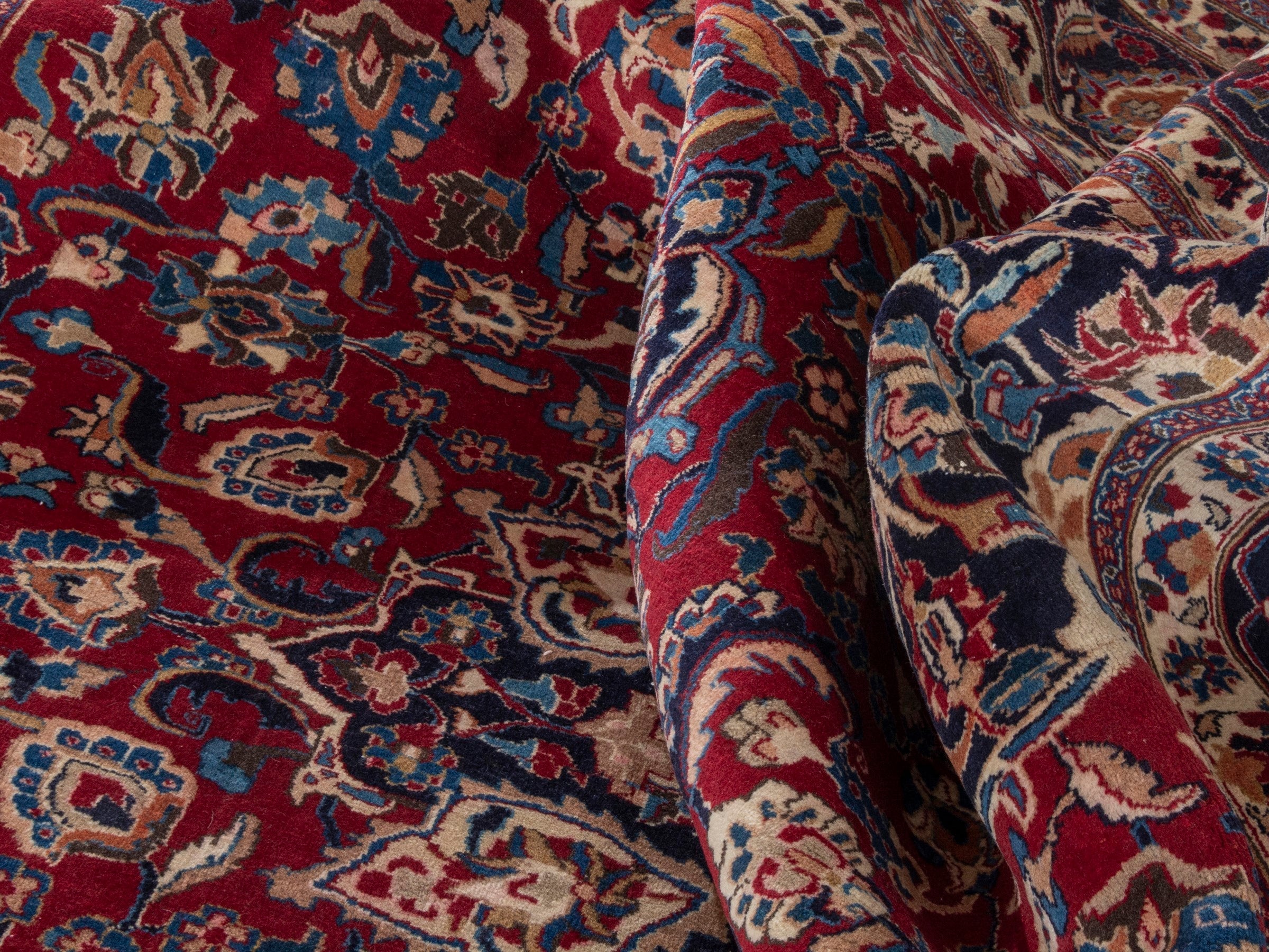 Persian Mashhad oversized rug in deep red and navy, view 18 of 22