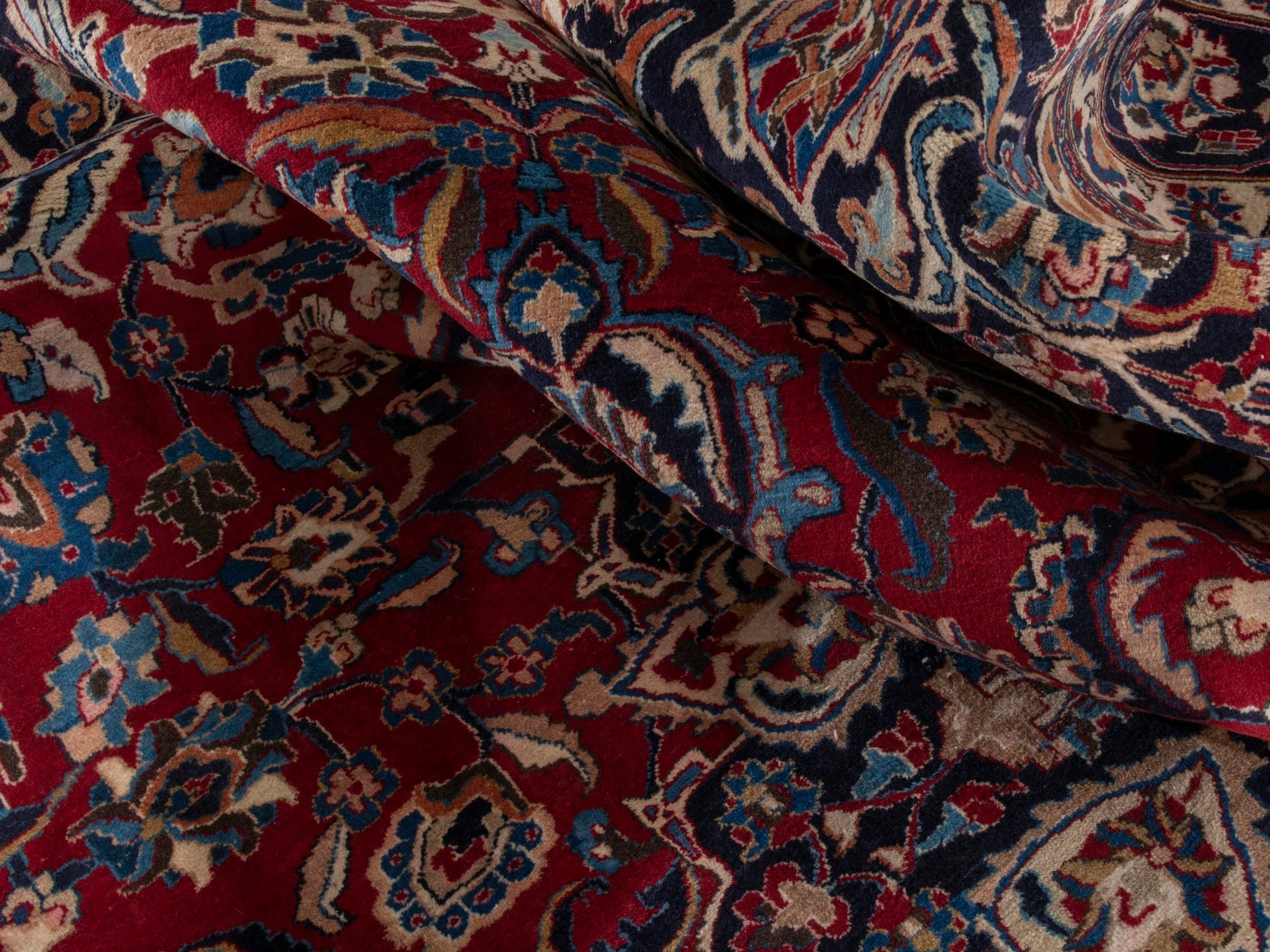 Persian Mashhad oversized rug in deep red and navy, view 19 of 22