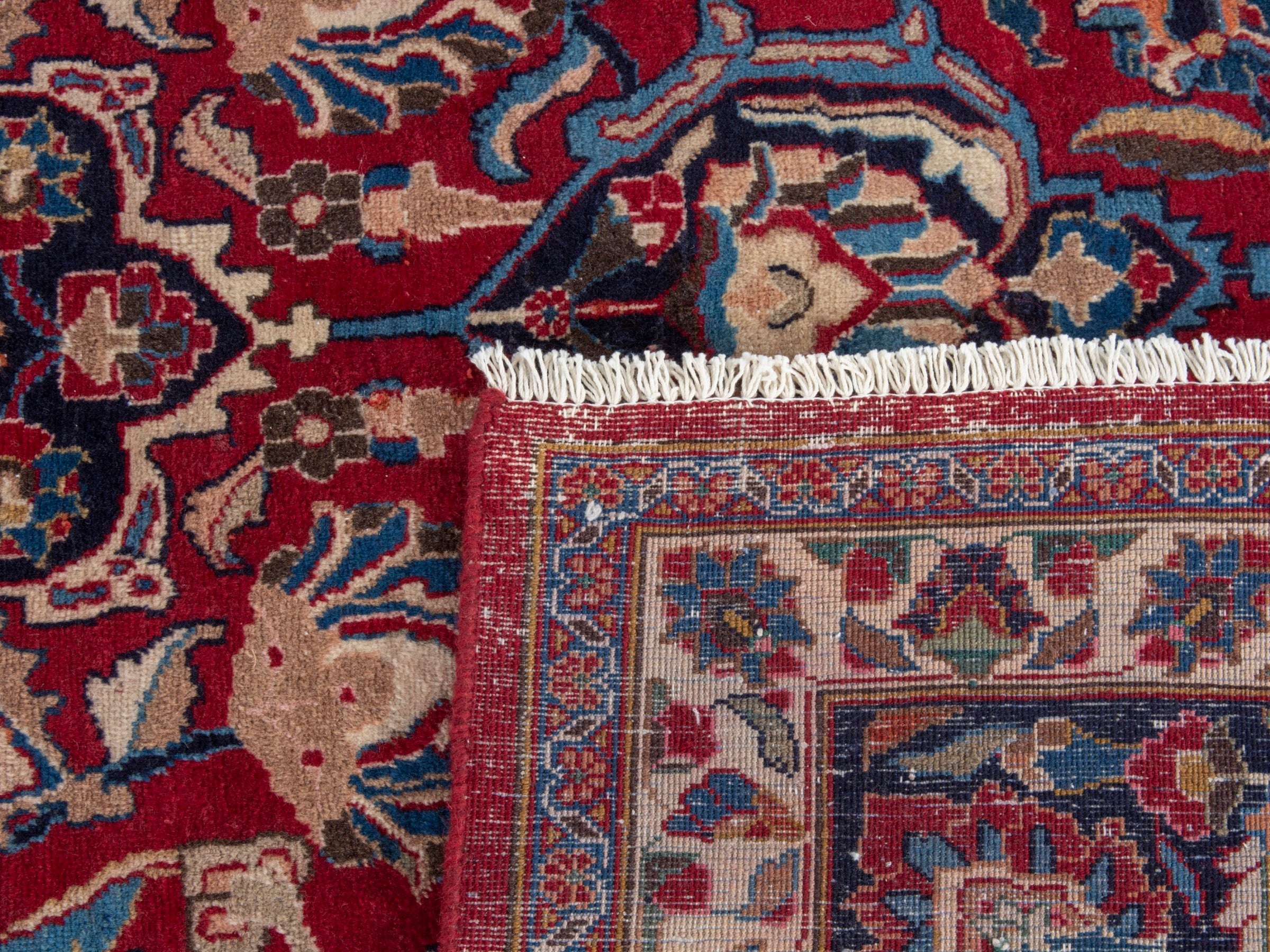 Persian Mashhad oversized rug in deep red and navy, view 22 of 22