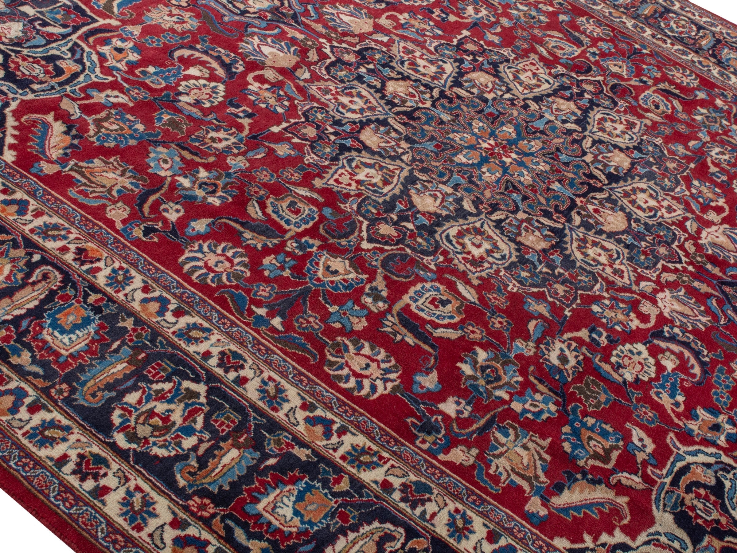 Persian Mashhad oversized rug in deep red and navy, view 4 of 22
