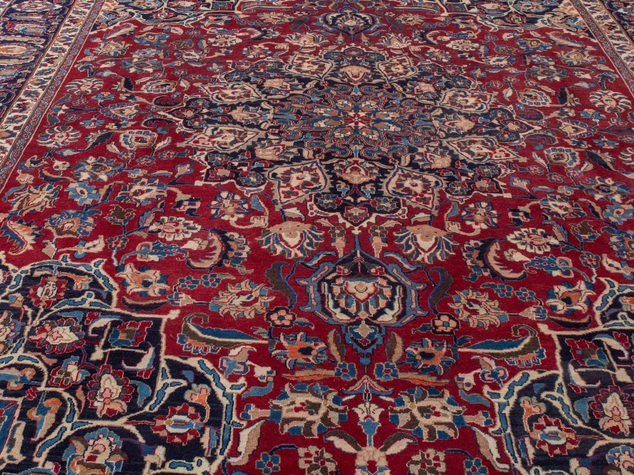 Persian Mashhad oversized rug in deep red and navy, view 7 of 22