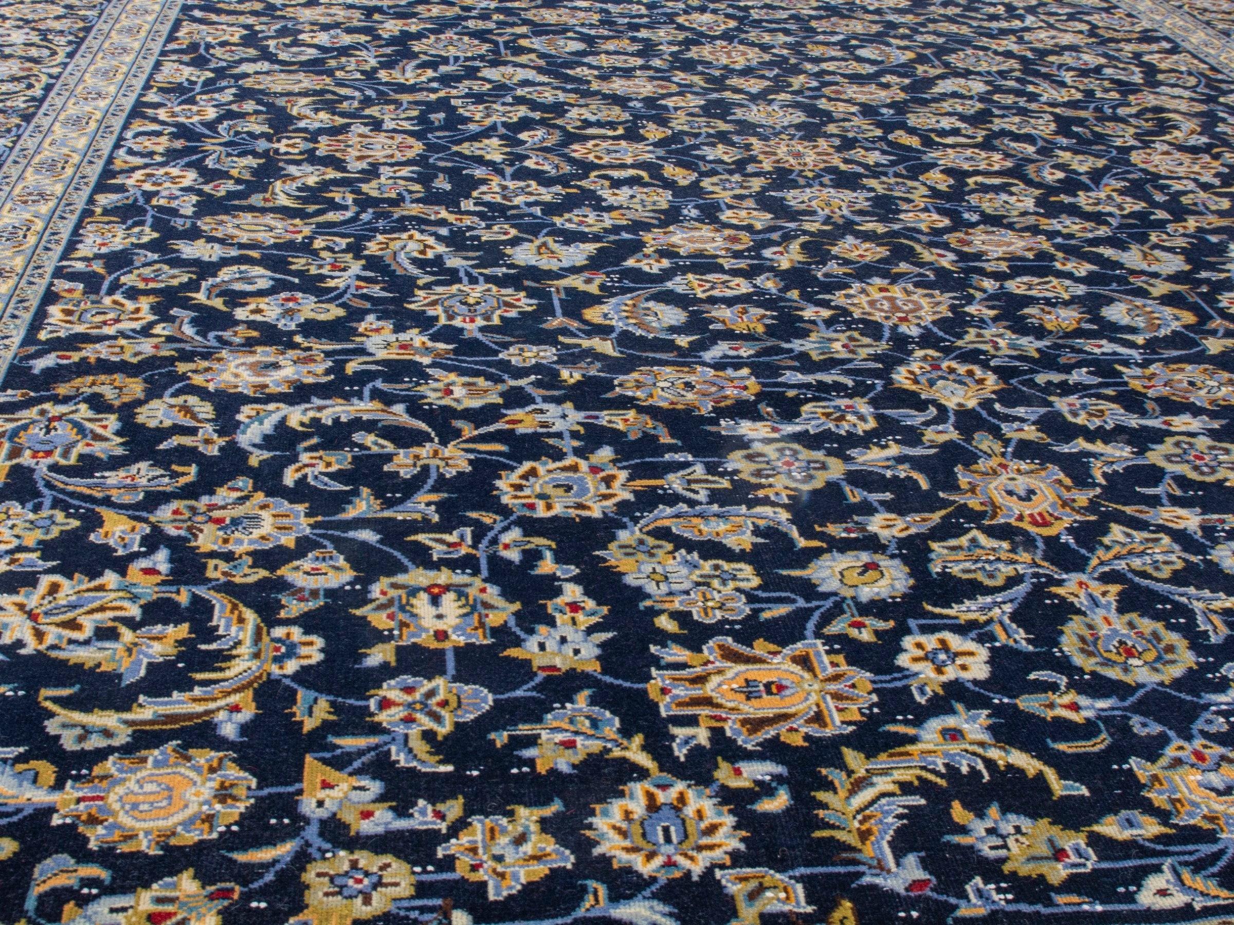 Persian Kashan oversized rug in navy and antique gold, view 8 of 20