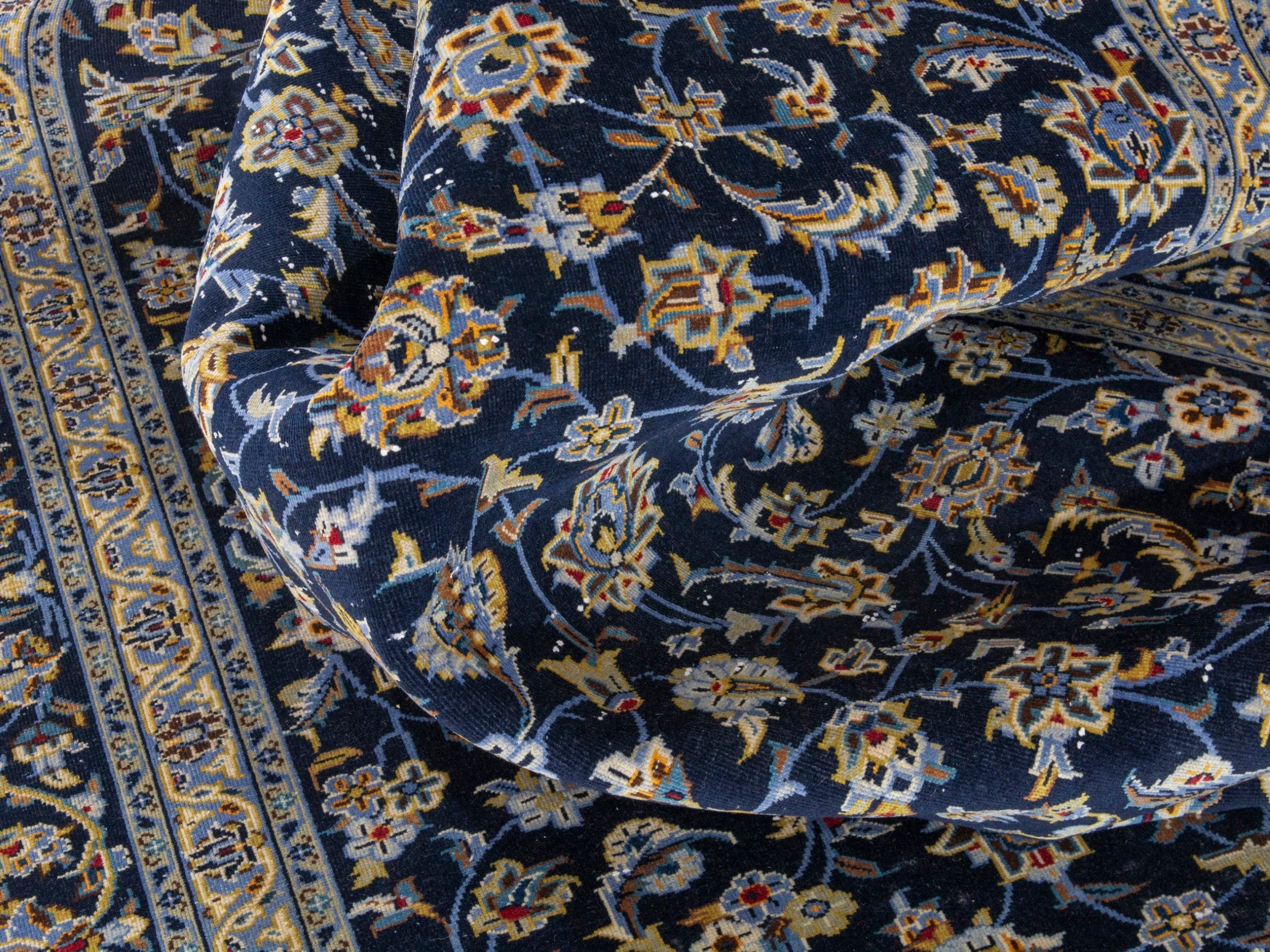 Persian Kashan oversized rug in navy and antique gold, view 16 of 20