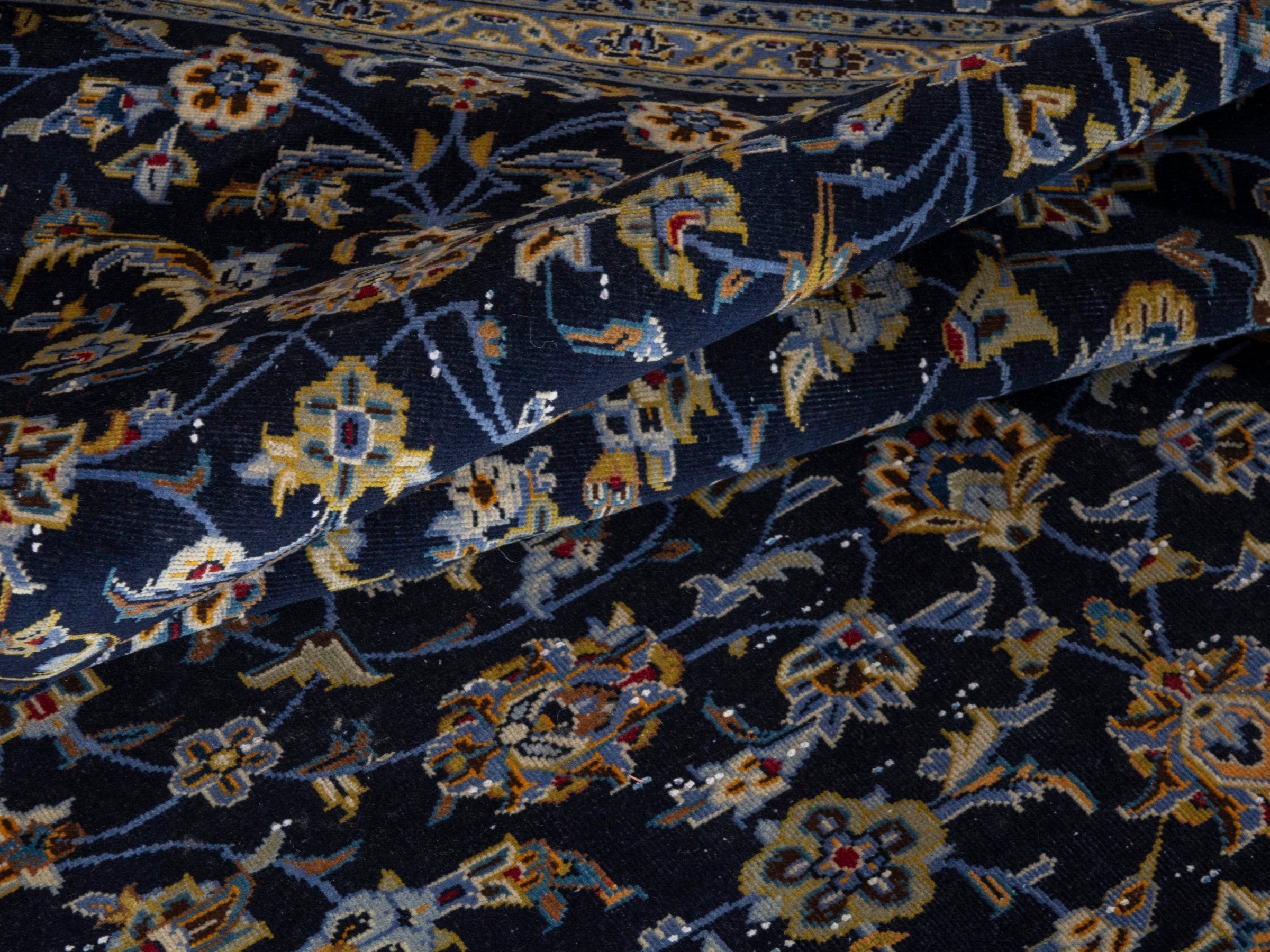 Persian Kashan oversized rug in navy and antique gold, view 17 of 20