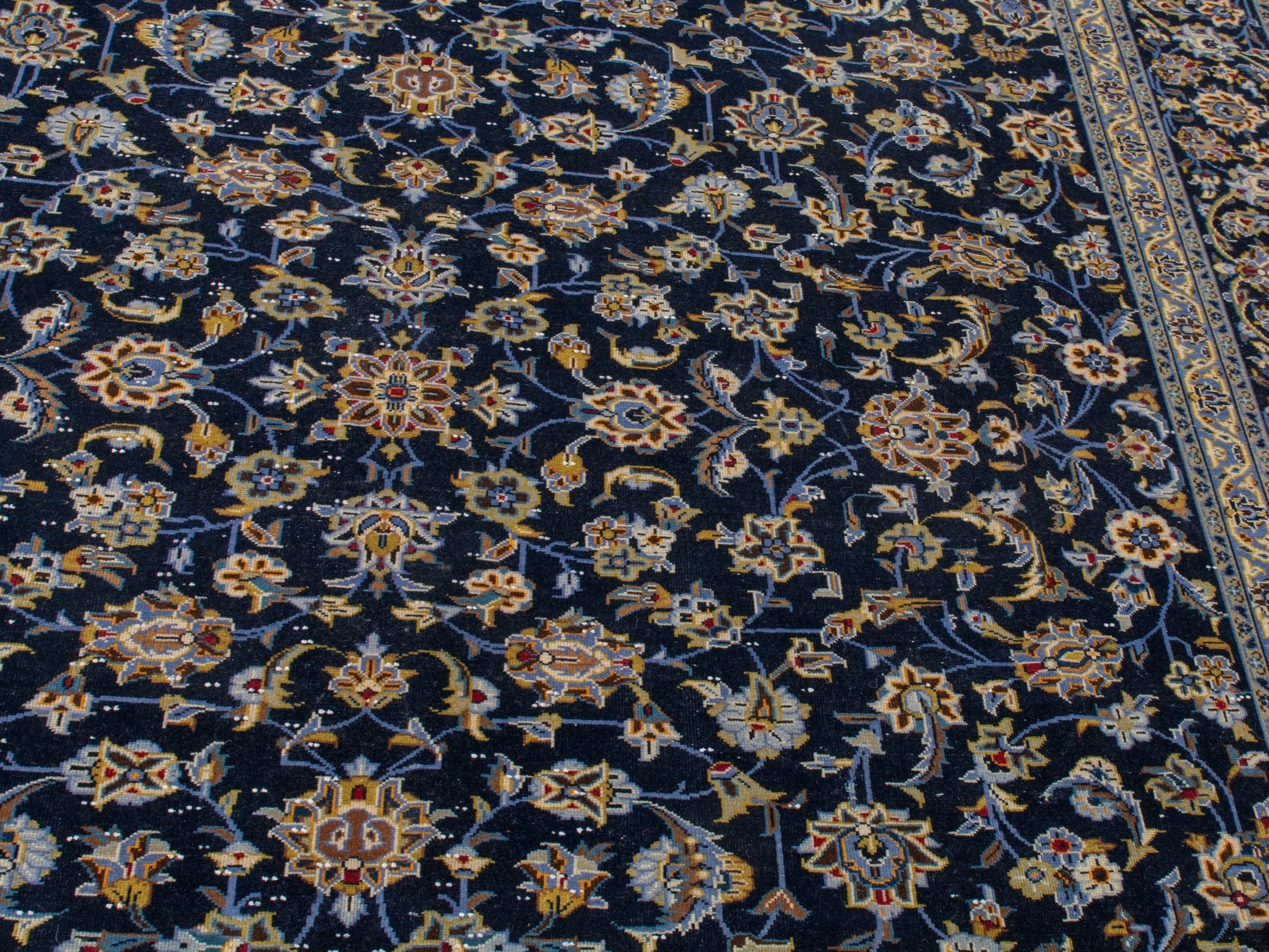 Persian Kashan oversized rug in navy and antique gold, view 9 of 20