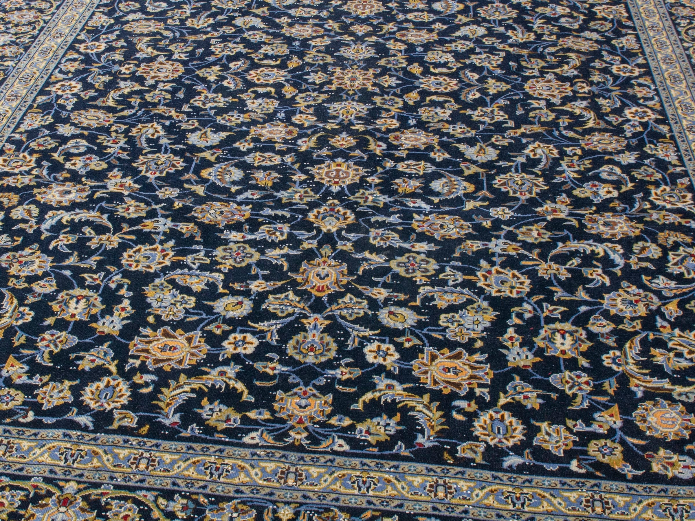 Persian Kashan oversized rug in navy and antique gold, view 7 of 20