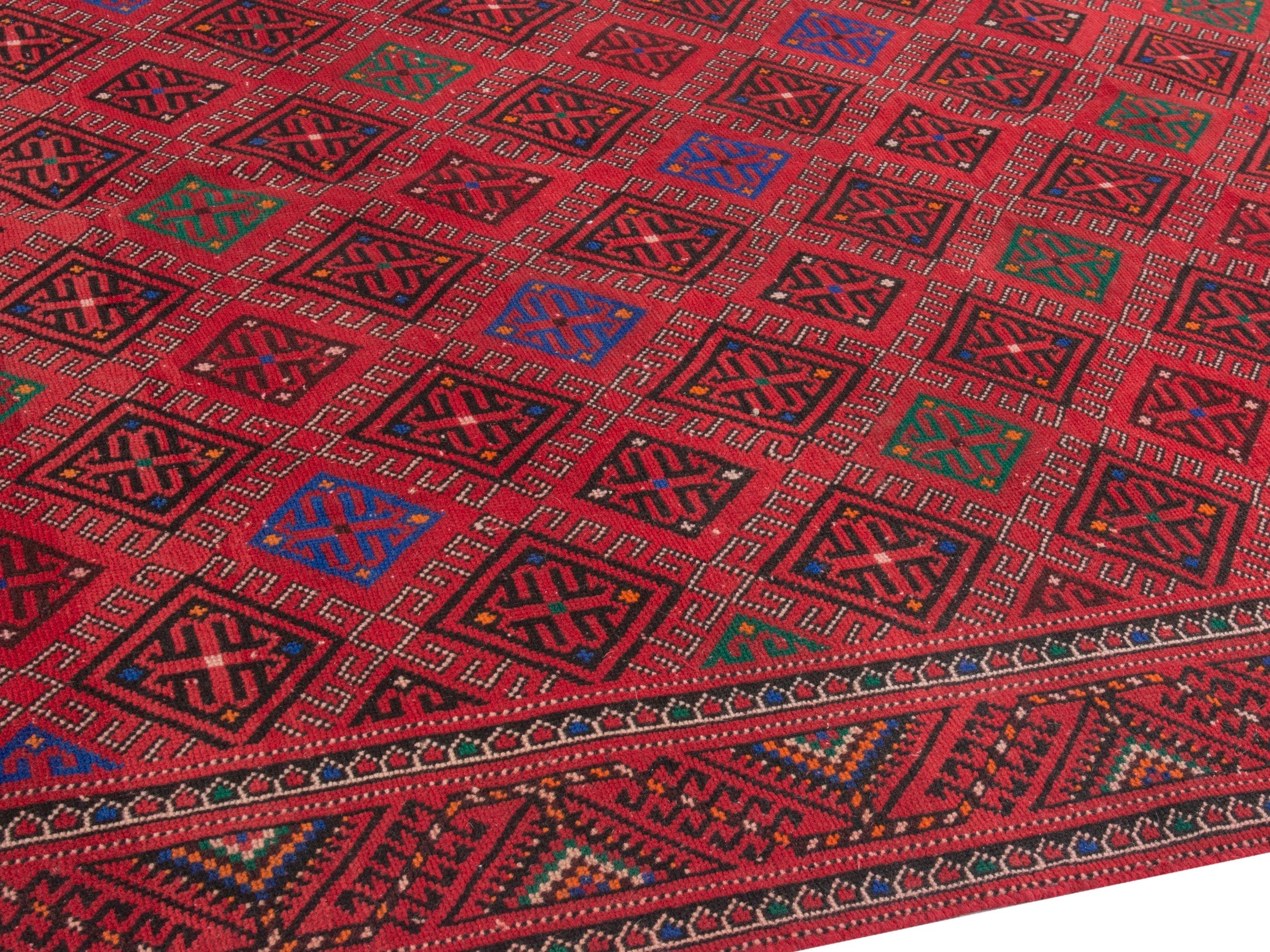 Persian Ghoochan area rug in burgundy and deep red, view 6 of 21