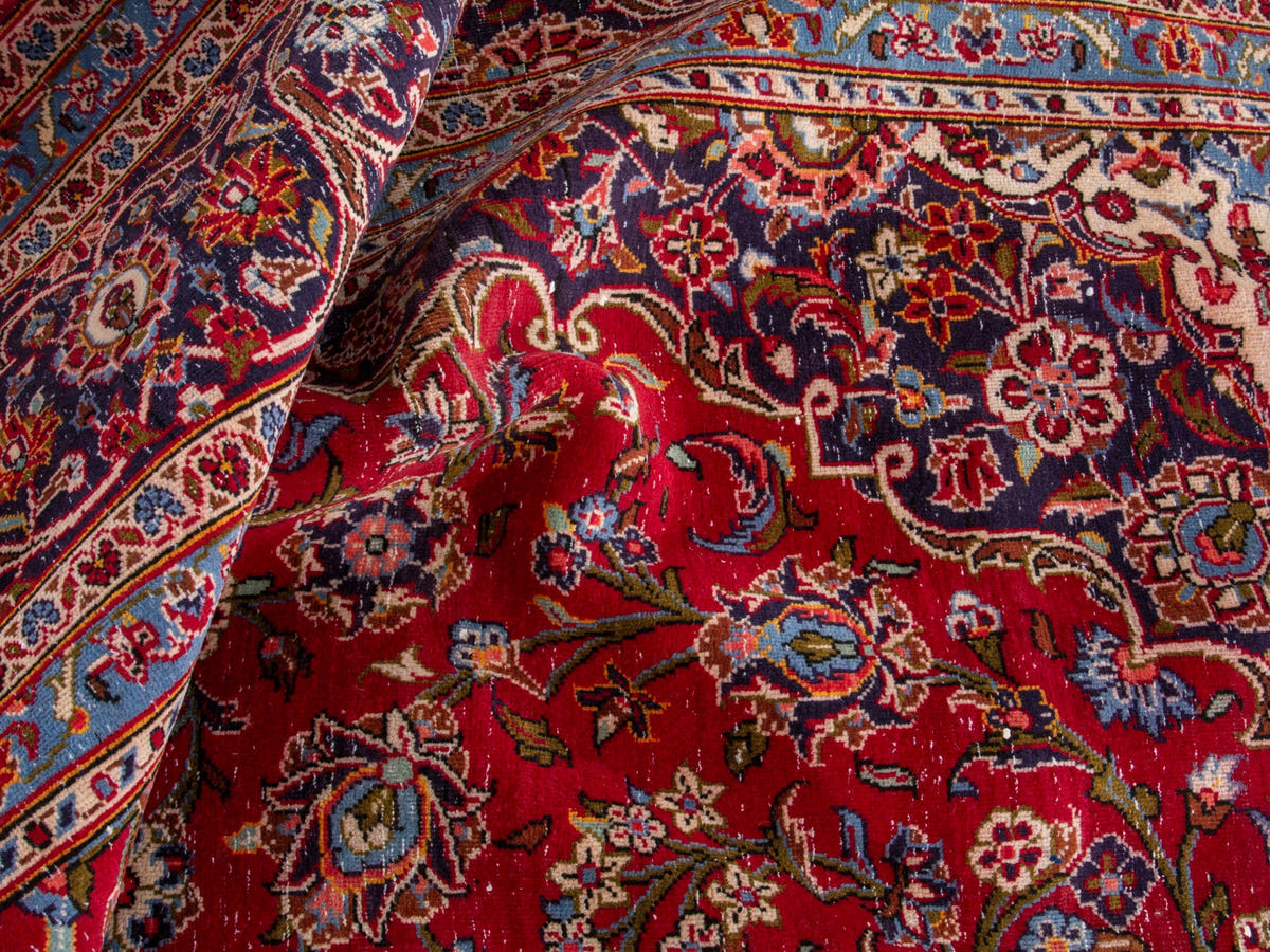 Persian Kashan oversized rug in deep red and navy, view 18 of 20