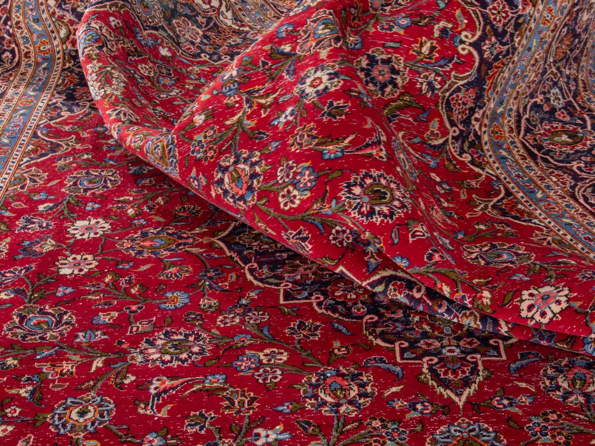 Persian Kashan oversized rug in deep red and navy, view 19 of 20