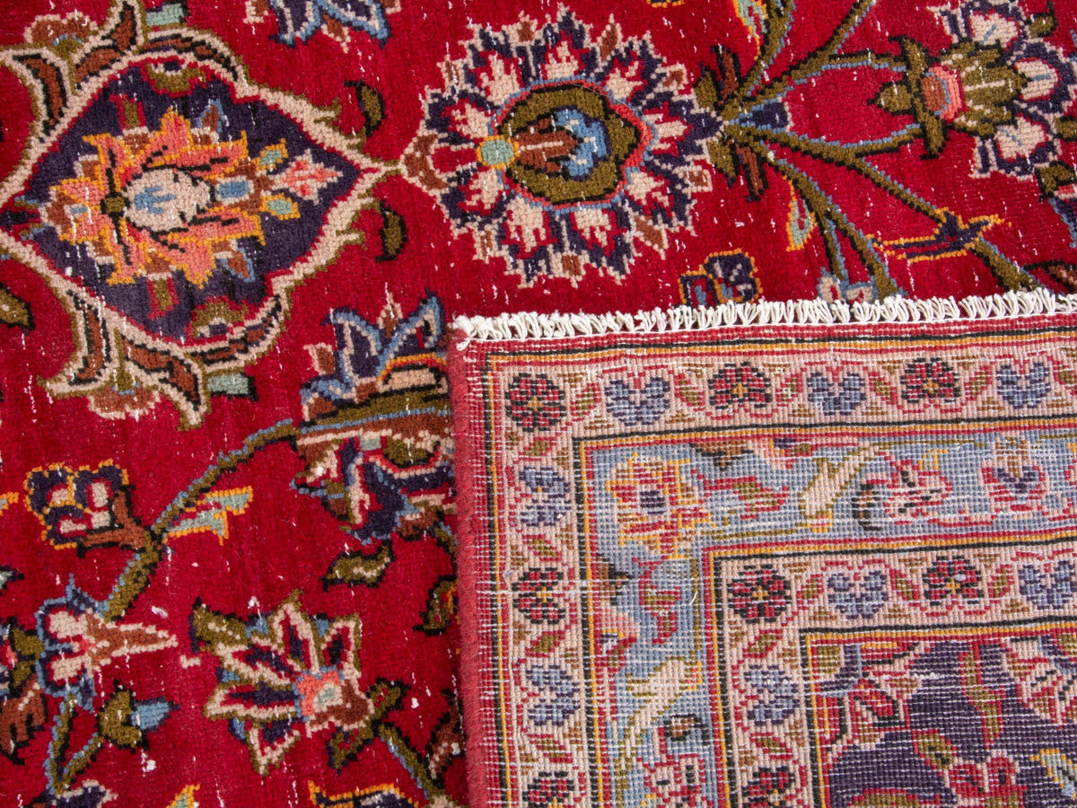 Persian Kashan oversized rug in deep red and navy, view 20 of 20