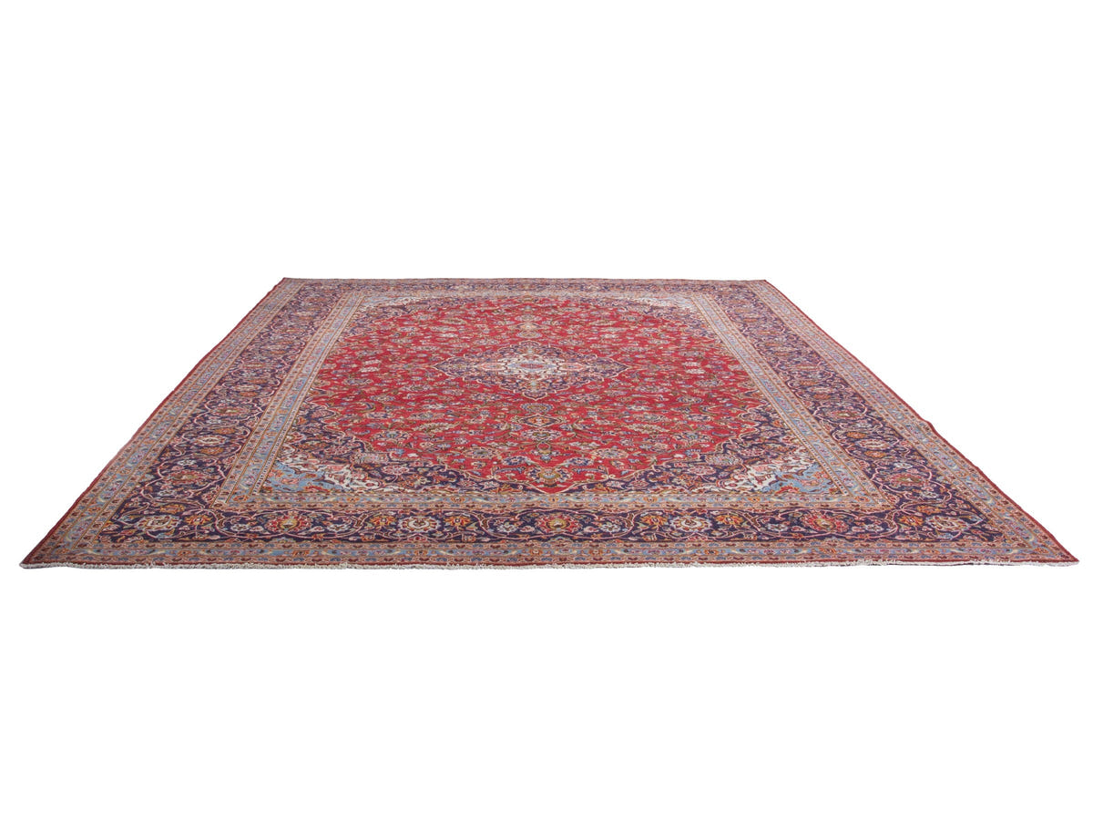 Persian Kashan oversized rug in deep red and navy, view 4 of 20