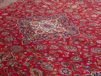 Persian Kashan oversized rug in deep red and navy, view 10 of 20