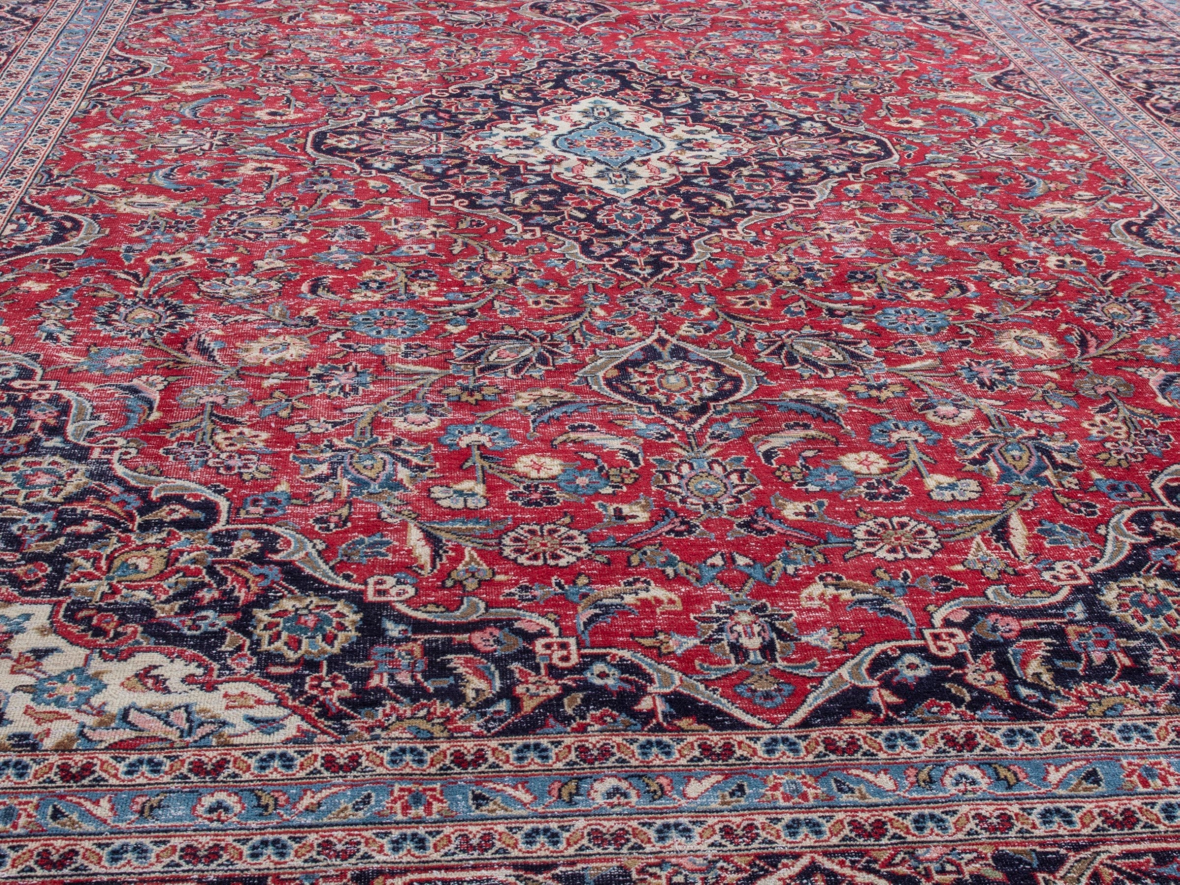 Persian Kashan oversized rug in deep red and dark brown, view 8 of 21