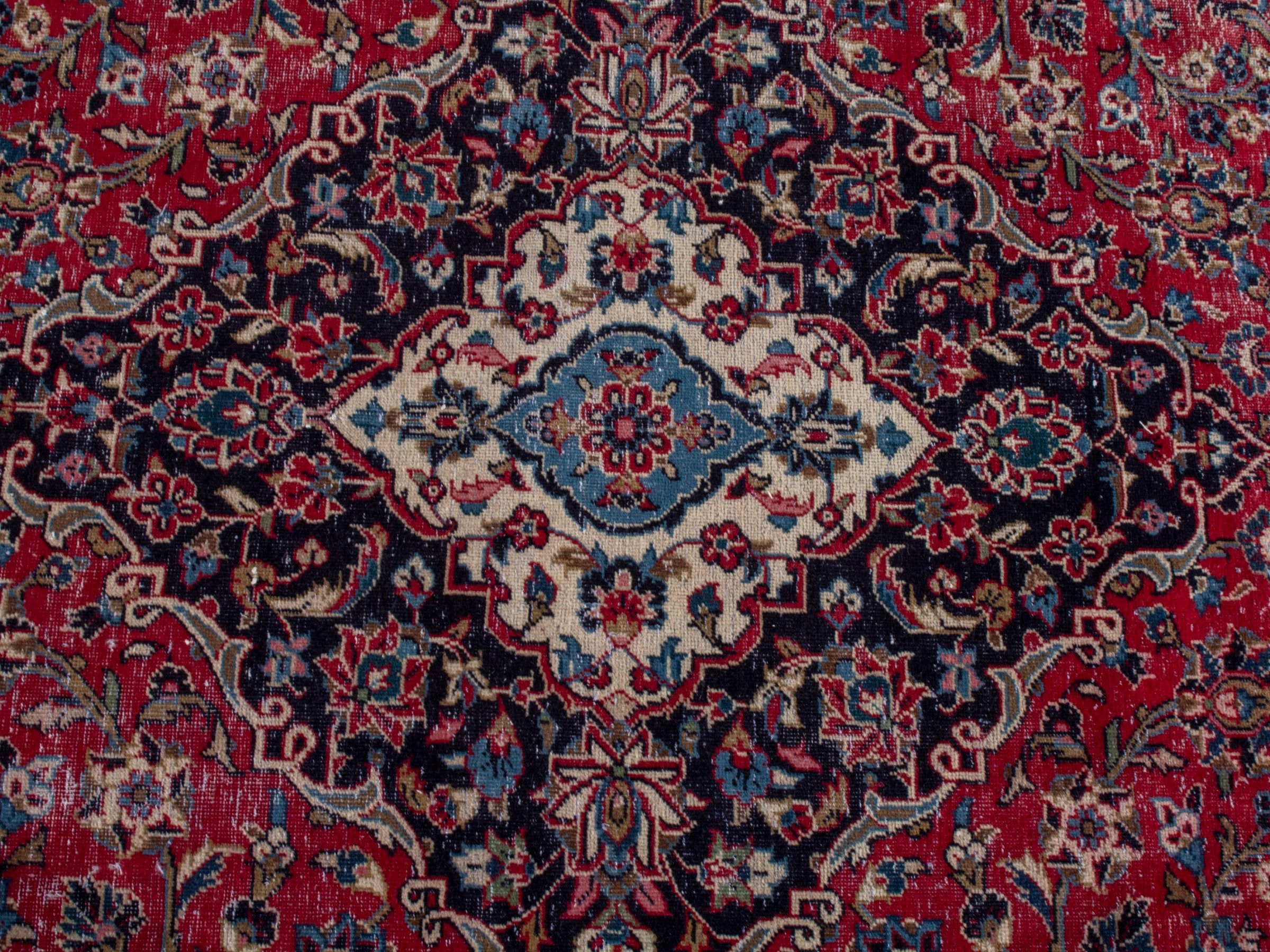 Persian Kashan oversized rug in deep red and dark brown, view 13 of 21