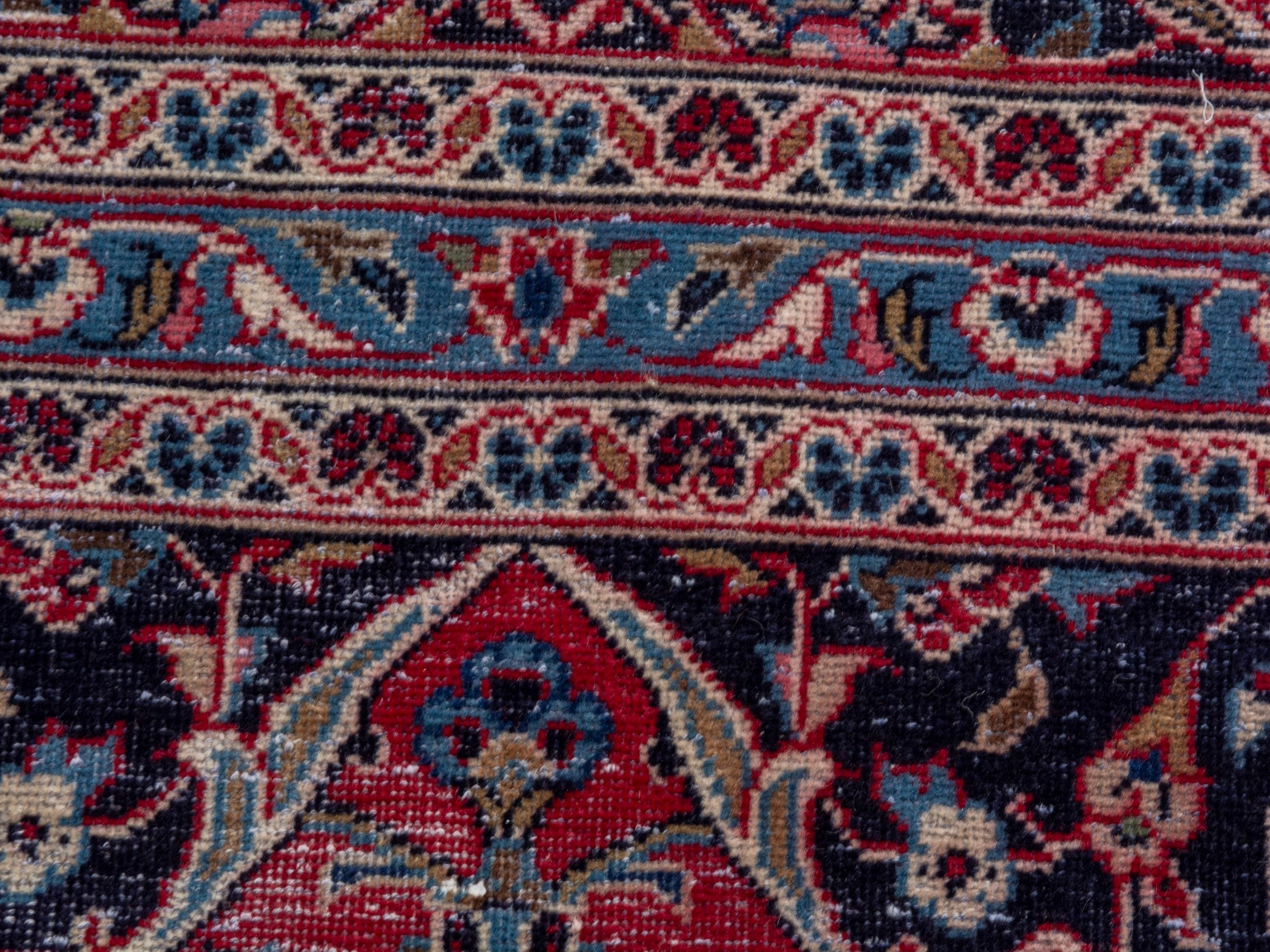 Persian Kashan oversized rug in deep red and dark brown, view 15 of 21