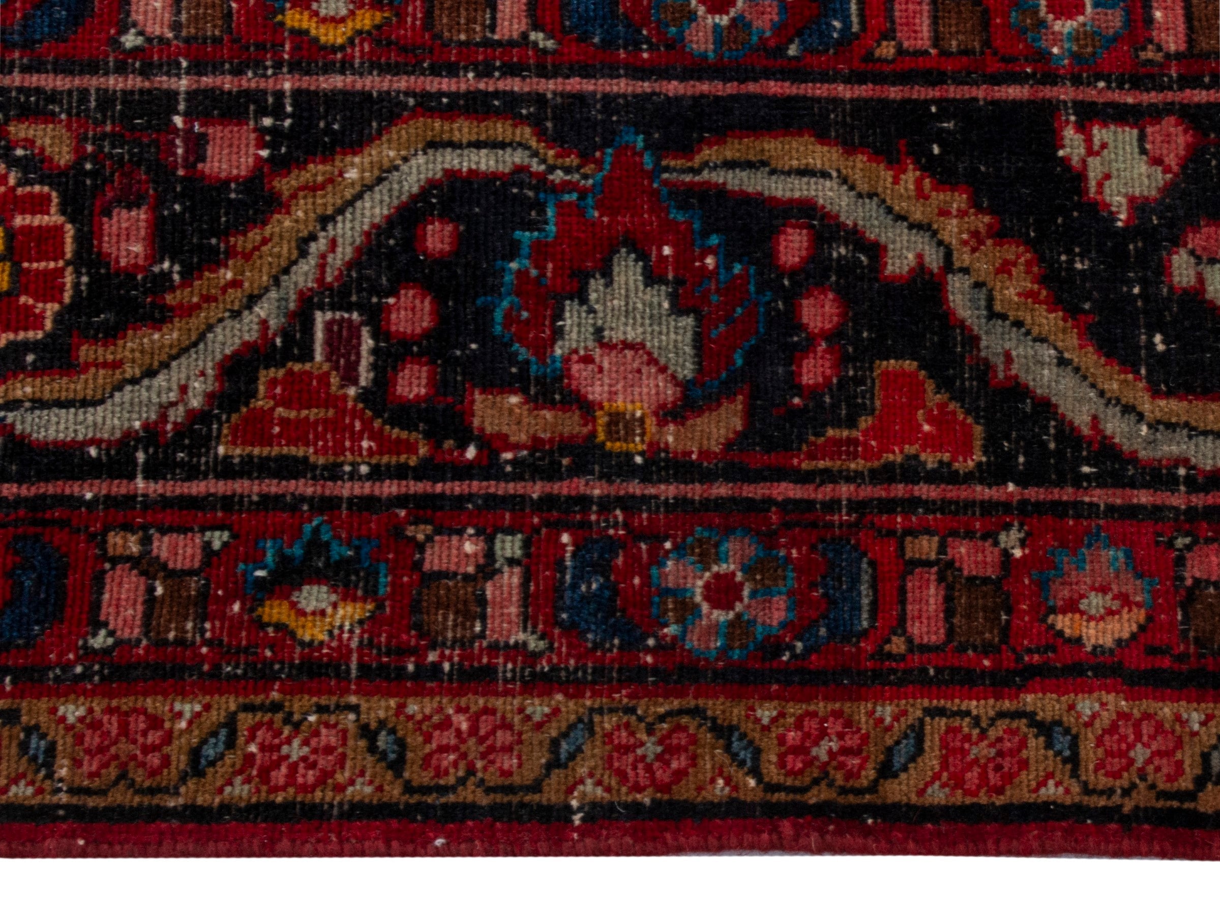 Persian Lilihan area rug in deep red and dark blue, view 10 of 24