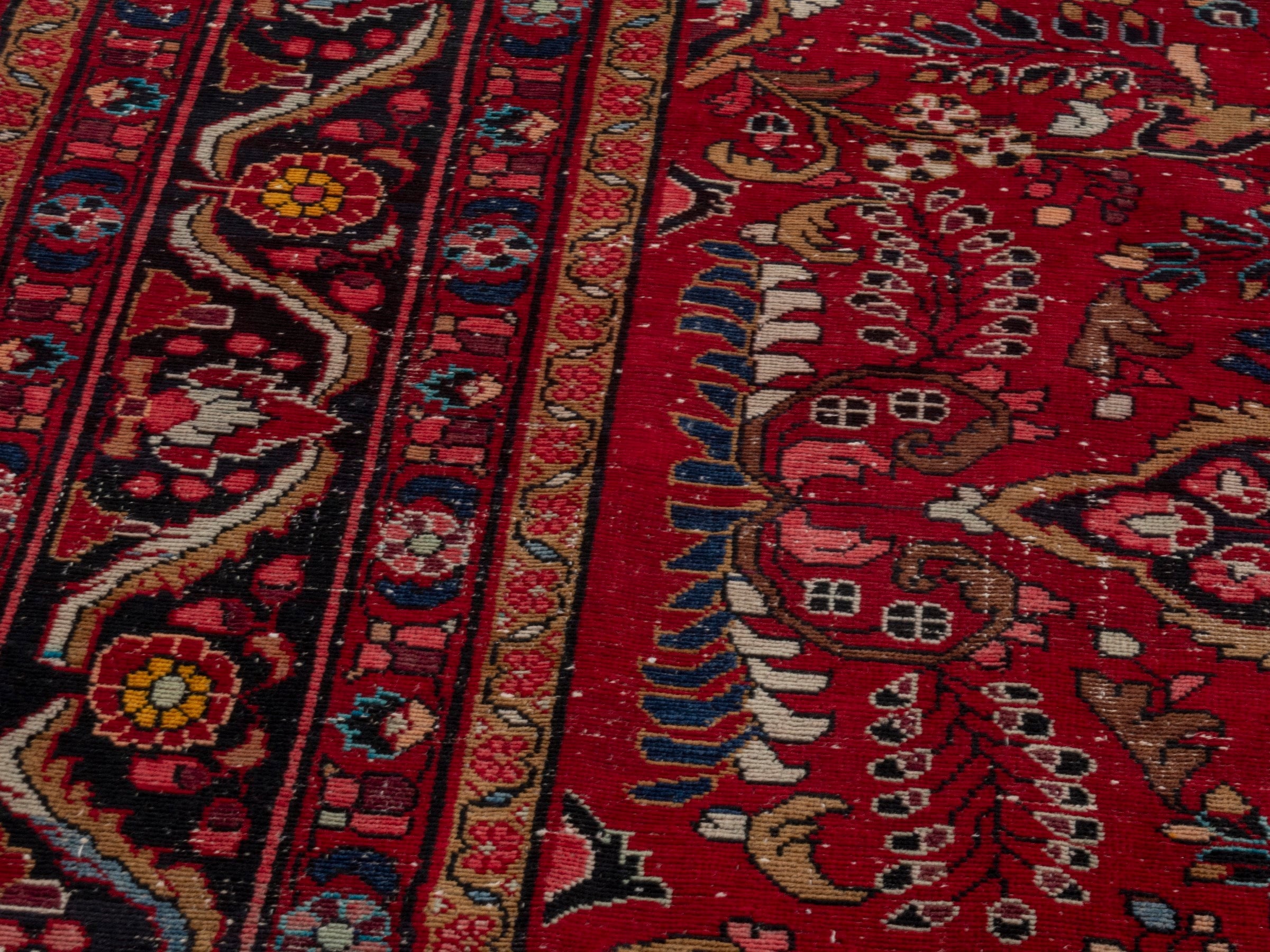 Persian Lilihan area rug in deep red and dark blue, view 9 of 24