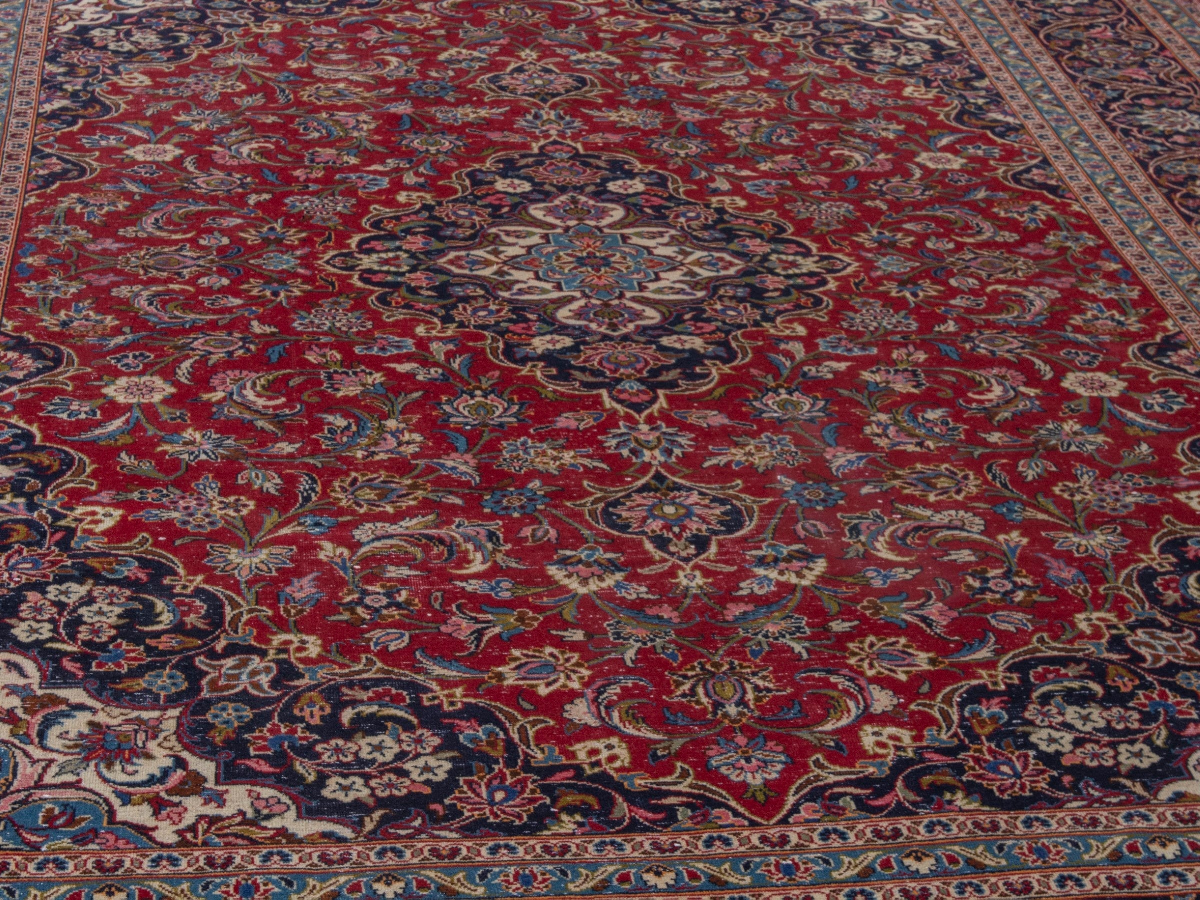 Persian Kashan oversized rug in deep red and dark blue, view 8 of 22