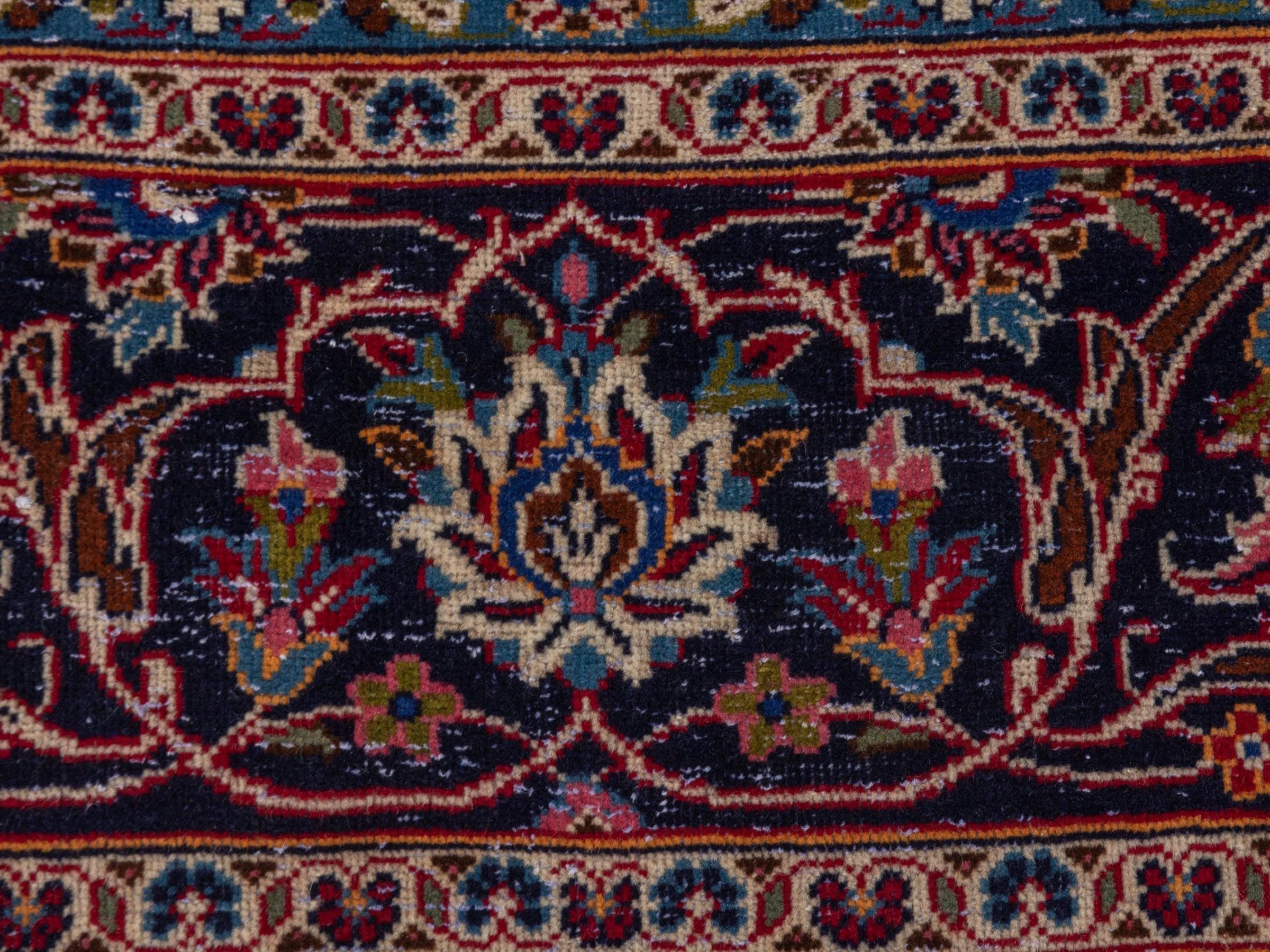 Persian Kashan oversized rug in deep red and dark blue, view 11 of 22