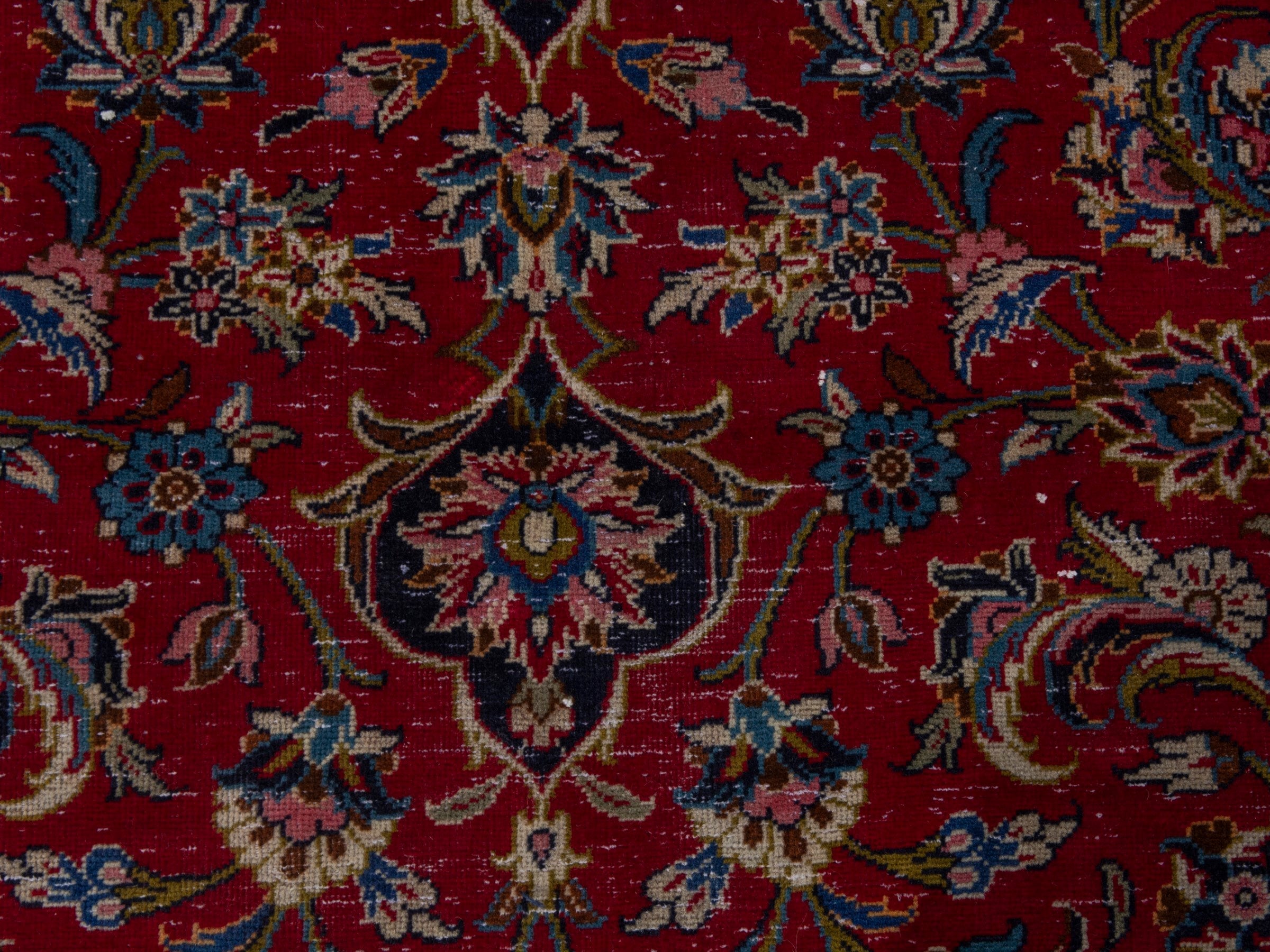 Persian Kashan oversized rug in deep red and dark blue, view 13 of 22