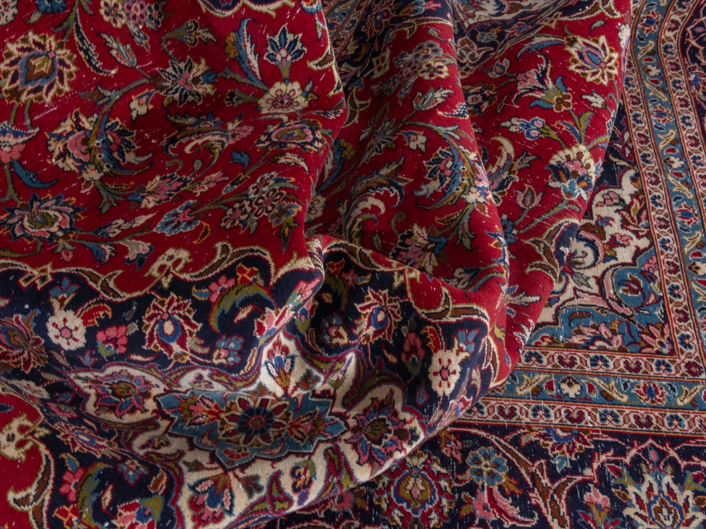 Persian Kashan oversized rug in deep red and dark blue, view 18 of 22