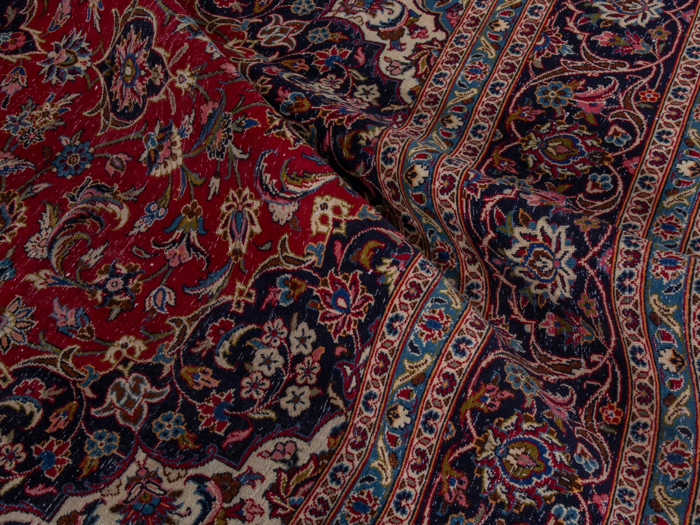 Persian Kashan oversized rug in deep red and dark blue, view 21 of 22