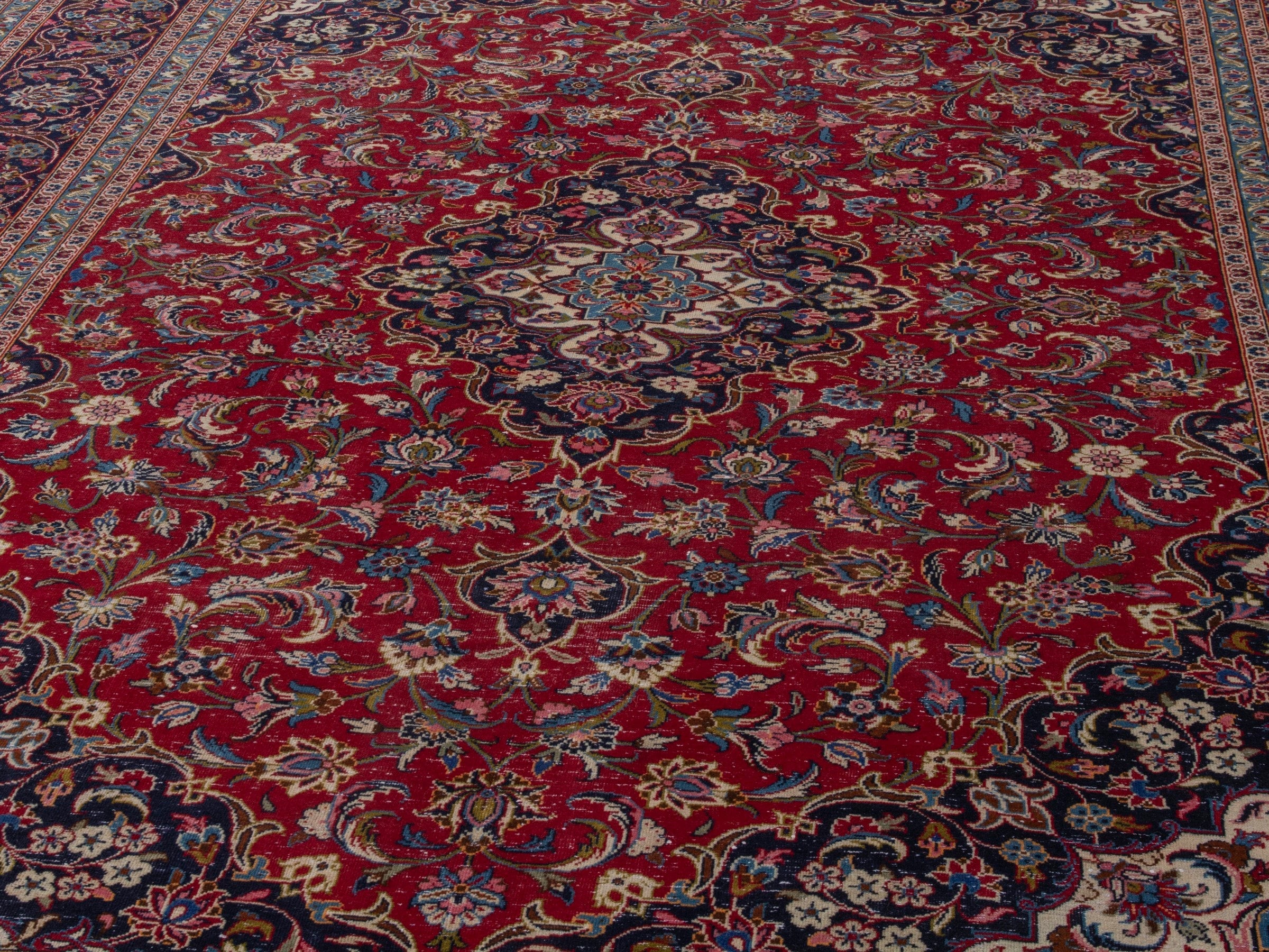Persian Kashan oversized rug in deep red and dark blue, view 7 of 22