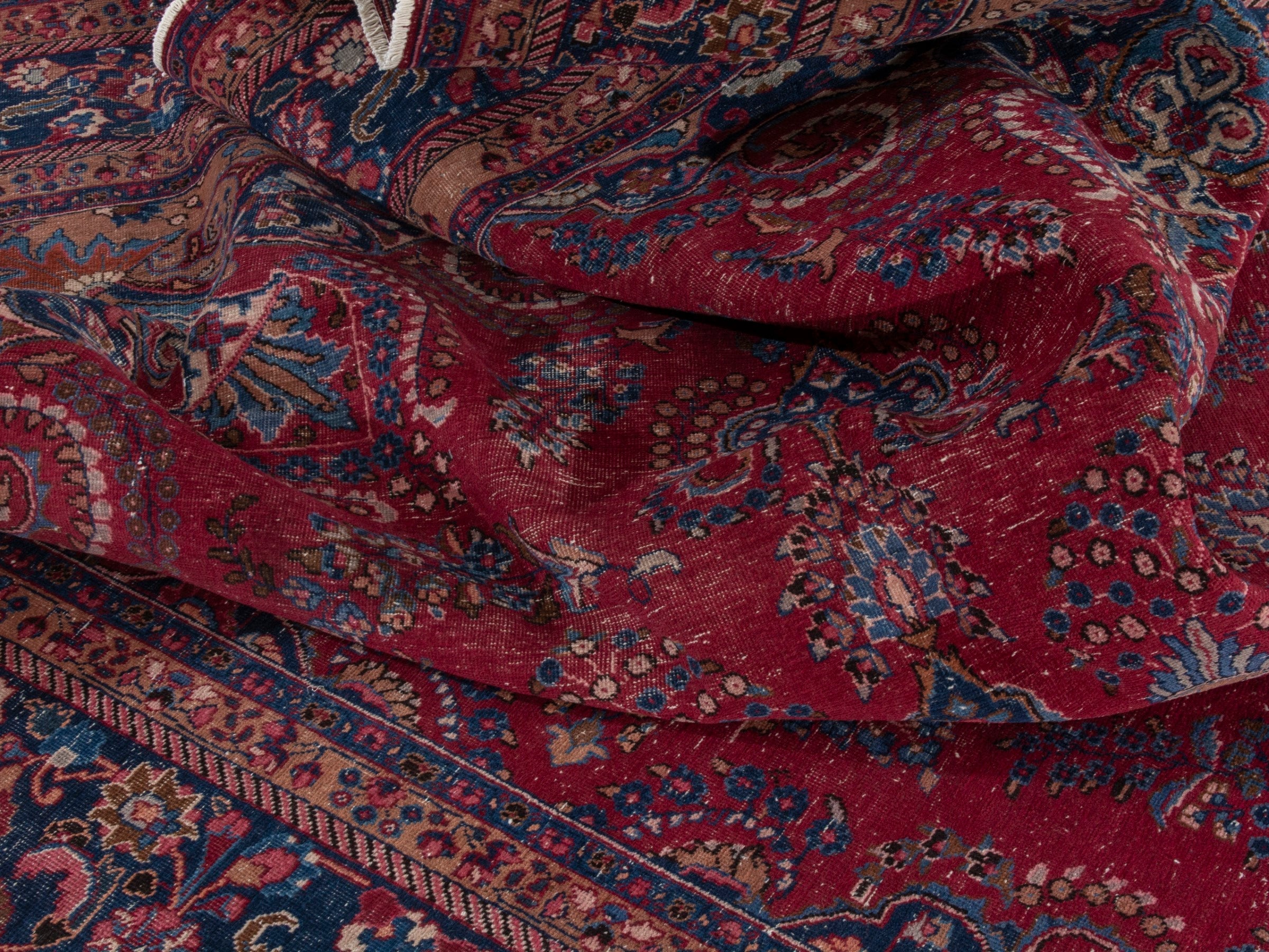 Persian Sabzevar oversized rug in deep red and navy, view 18 of 22