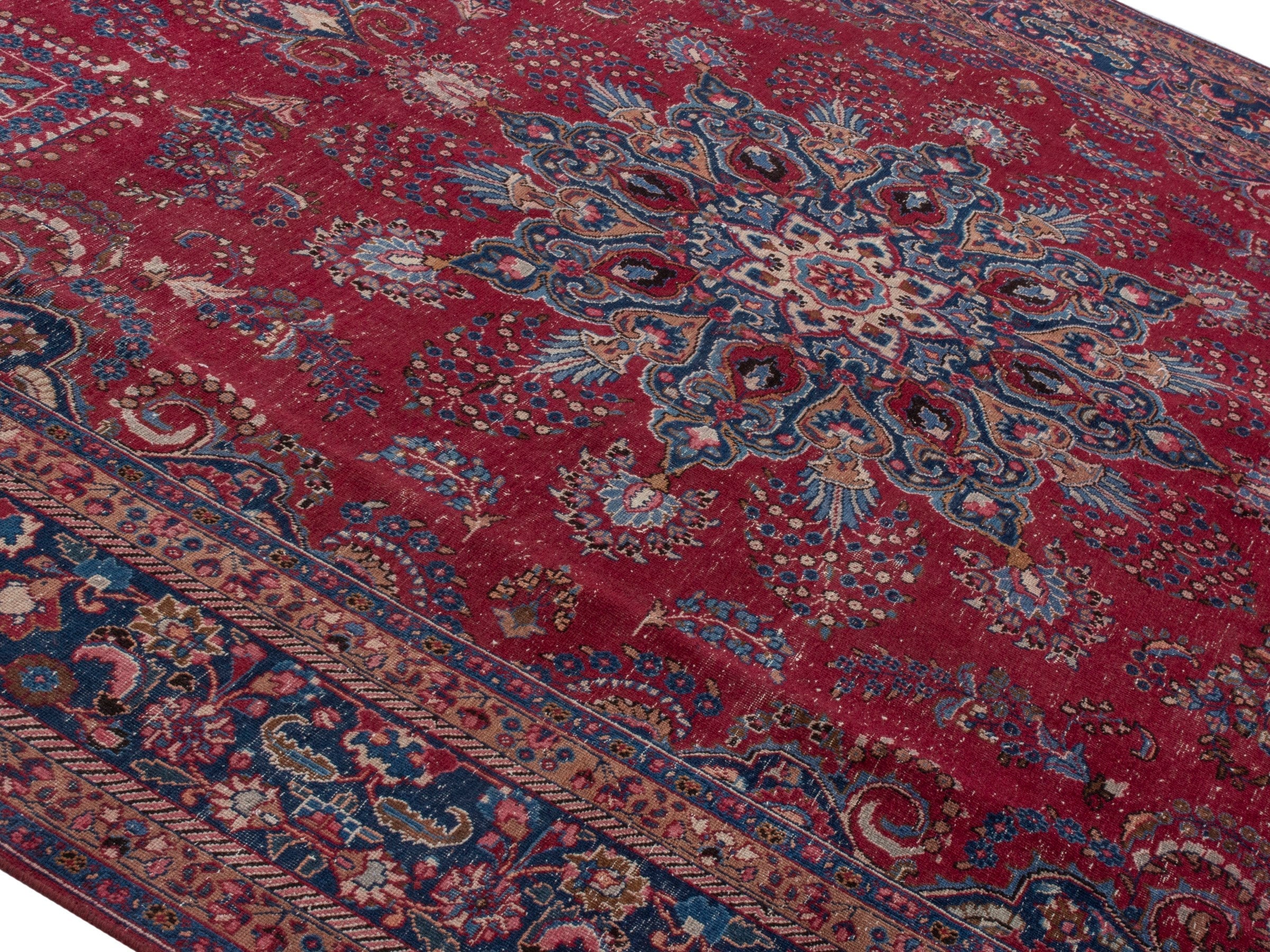 Persian Sabzevar oversized rug in deep red and navy, view 4 of 22