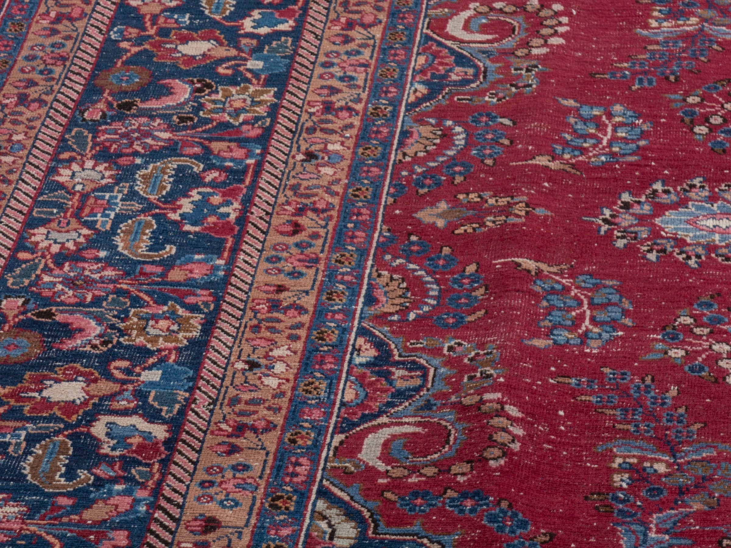 Persian Sabzevar oversized rug in deep red and navy, view 9 of 22