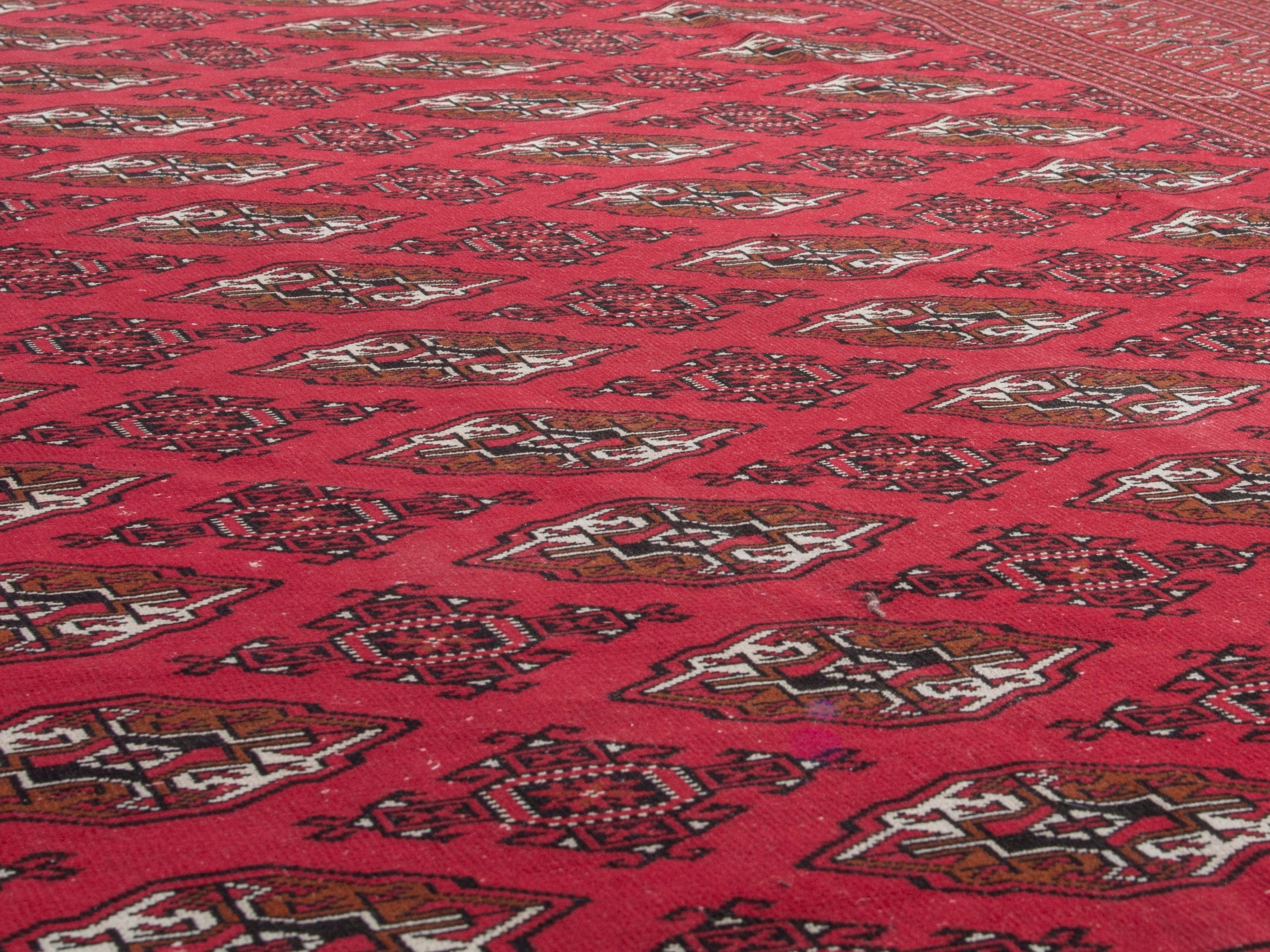 Persian Torkaman oversized rug in deep red and antique gold, view 8 of 19