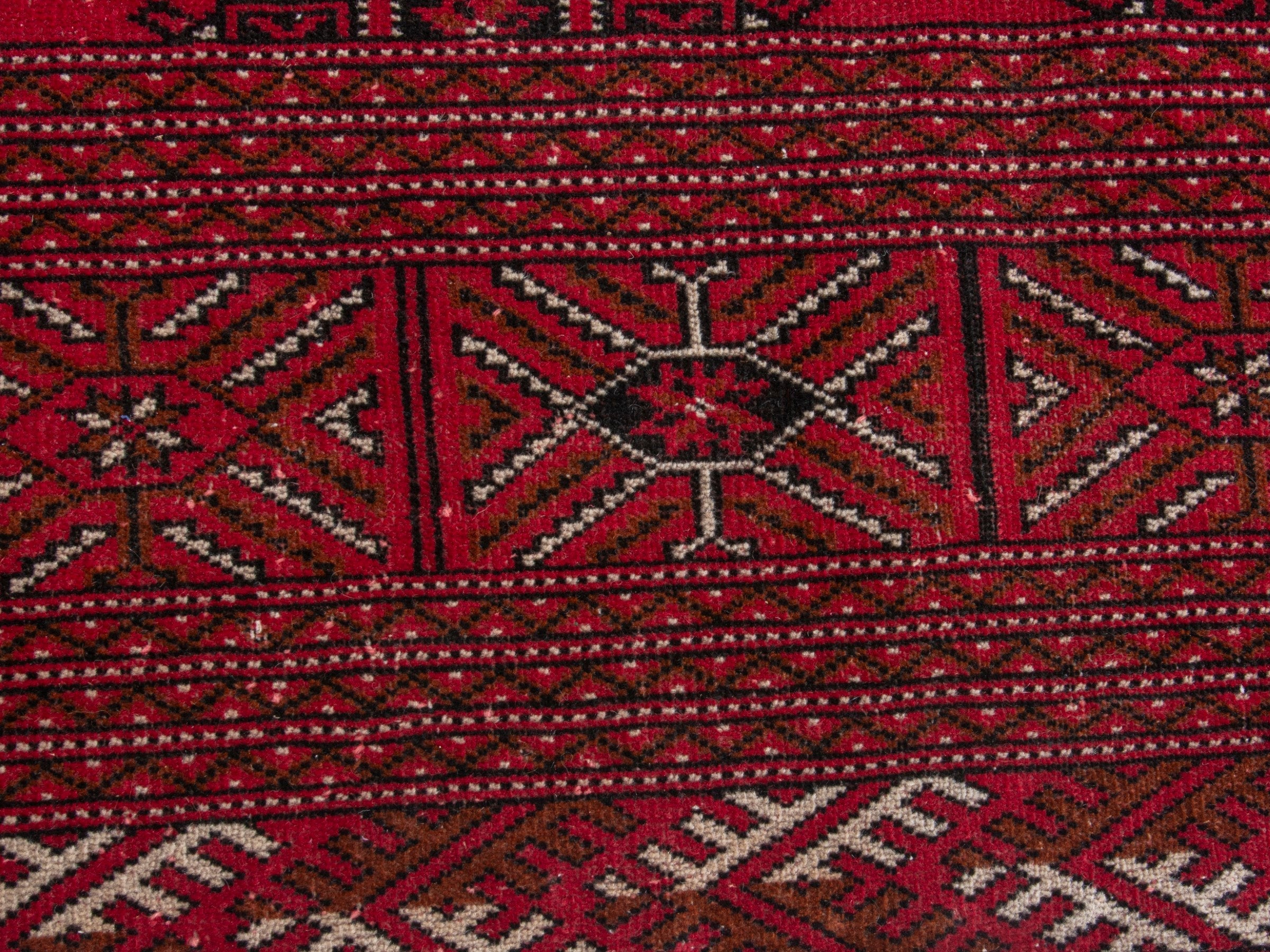 Persian Torkaman oversized rug in deep red and antique gold, view 11 of 19