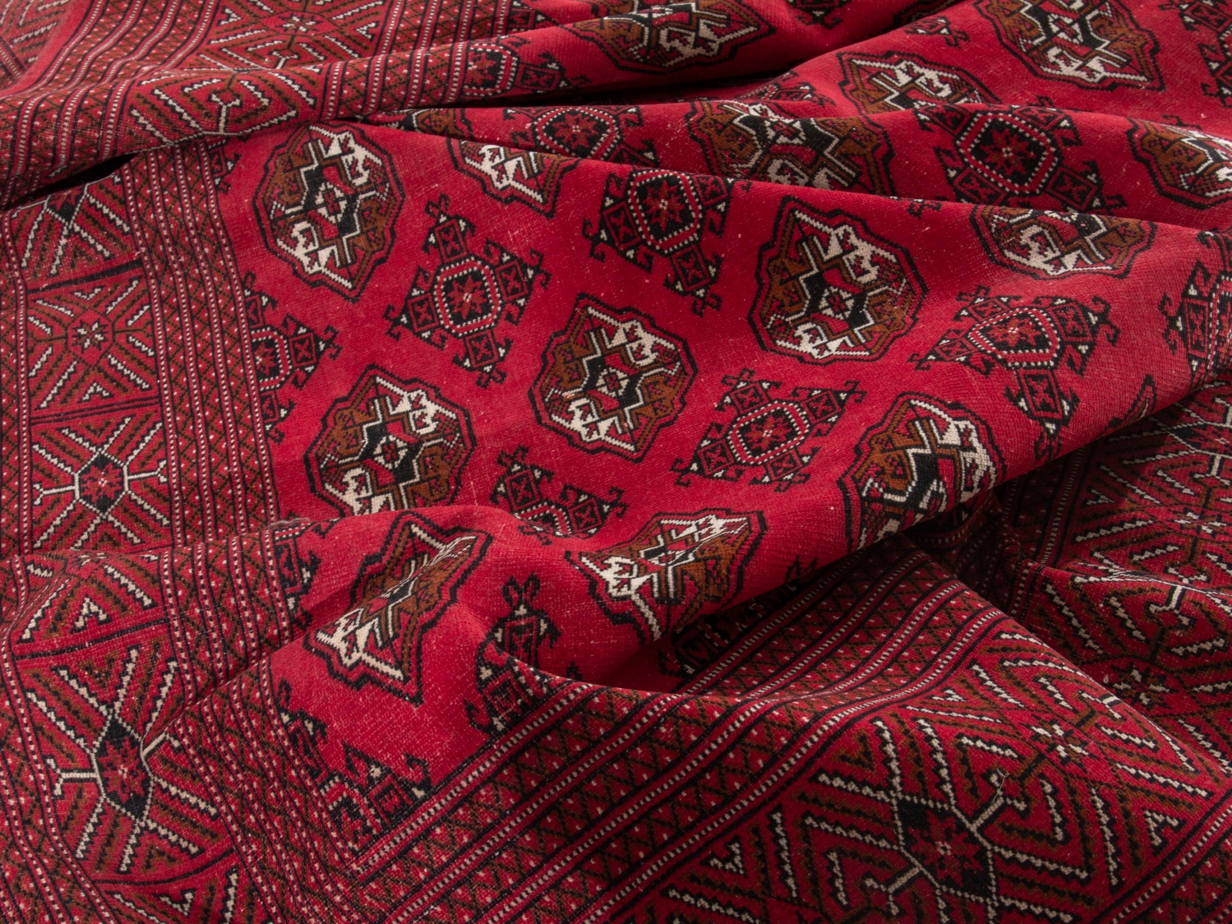 Persian Torkaman oversized rug in deep red and antique gold, view 16 of 19