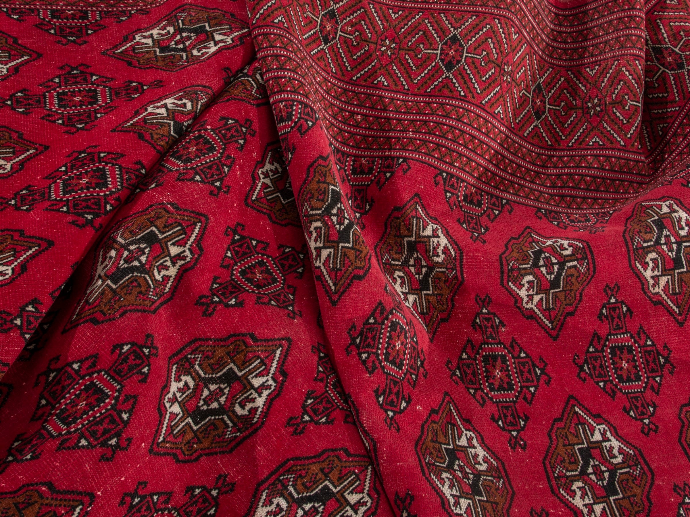 Persian Torkaman oversized rug in deep red and antique gold, view 17 of 19