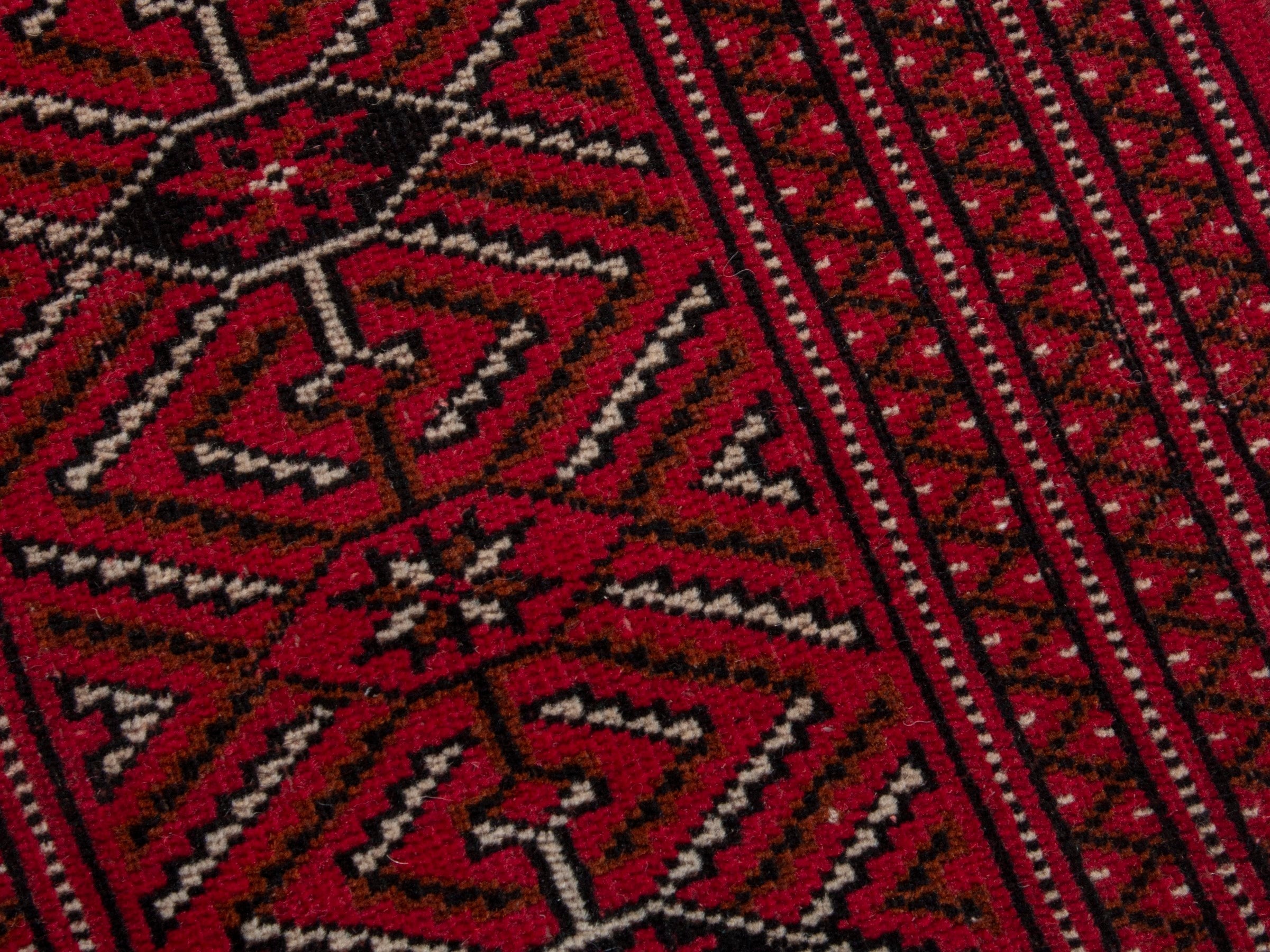 Persian Torkaman oversized rug in deep red and antique gold, view 9 of 19